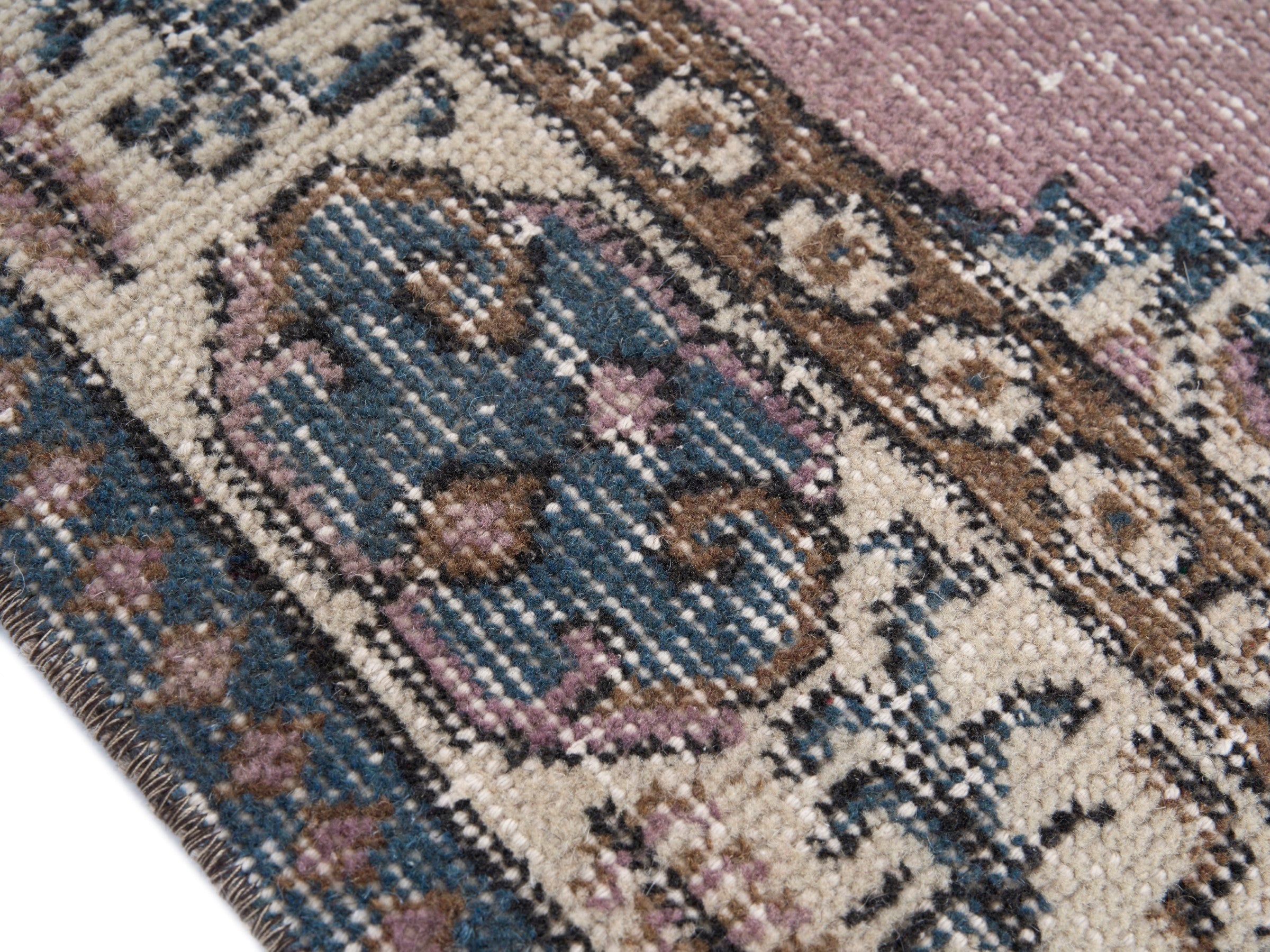 Turkish Isparta area rug in muted pink and cream, view 6 of 10