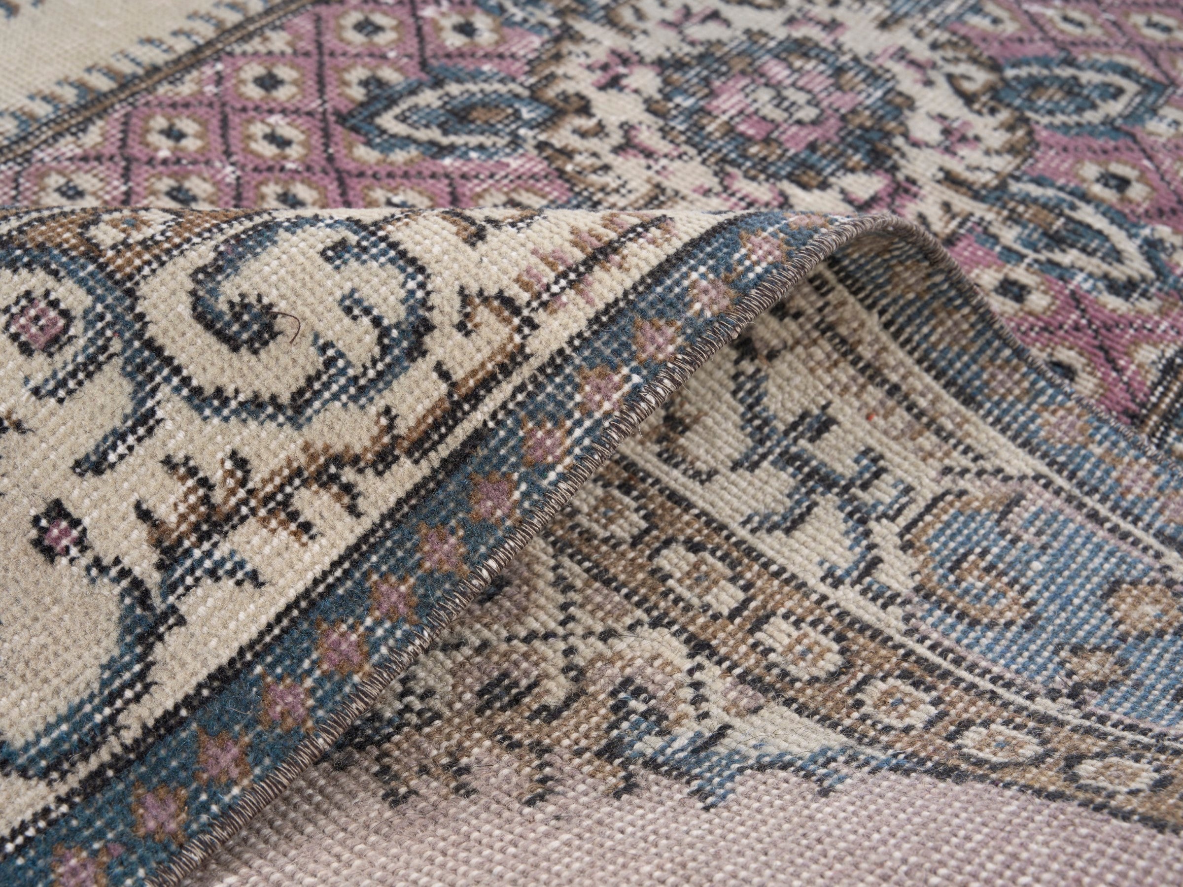 Turkish Isparta area rug in muted pink and cream, view 9 of 10