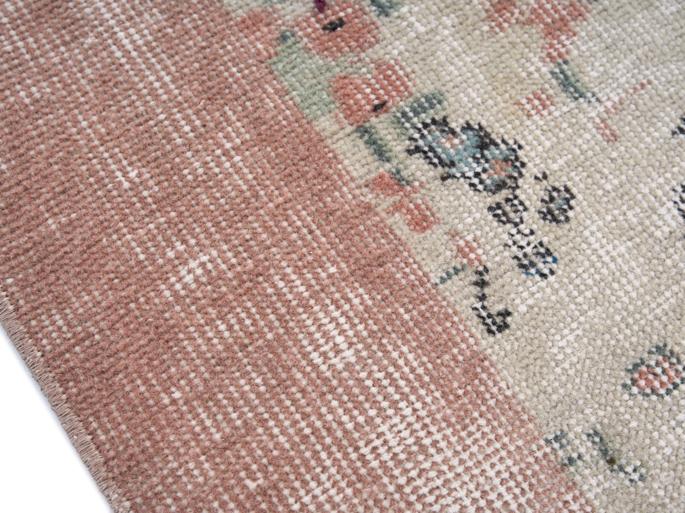 Turkish Isparta area rug in cream and dusty rose, view 6 of 10
