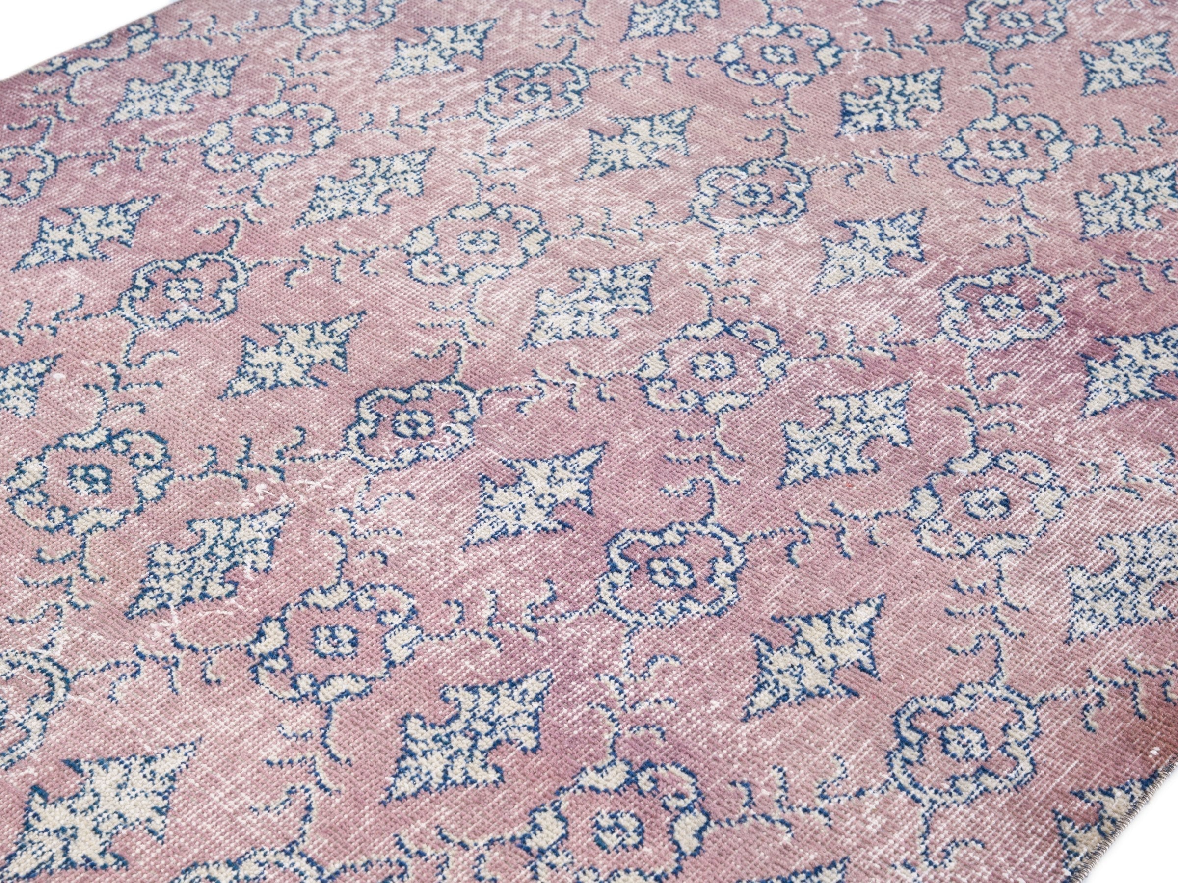 Turkish Isparta accent rug in muted pink and dusty blue, view 5 of 10