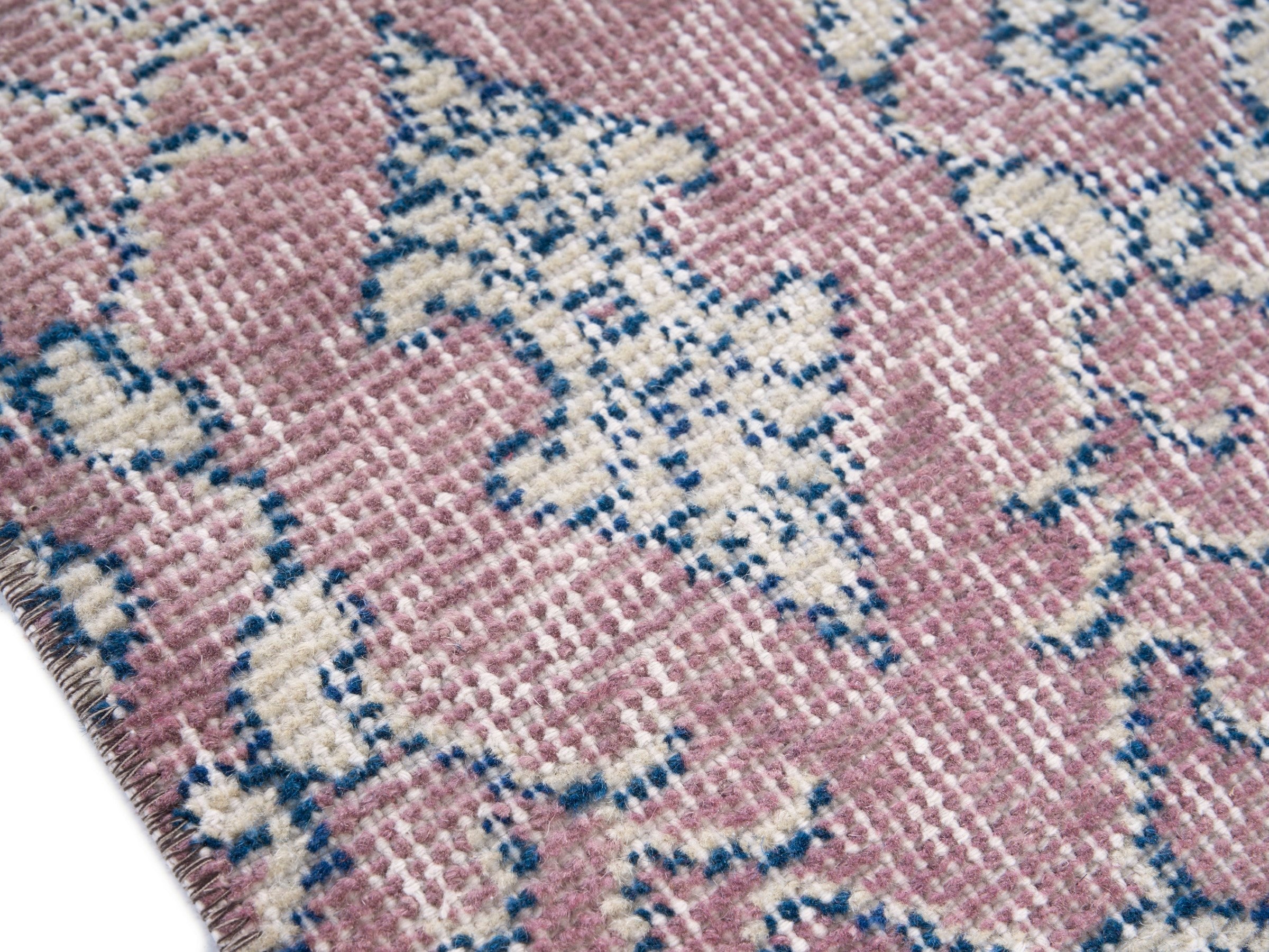 Turkish Isparta accent rug in muted pink and dusty blue, view 6 of 10
