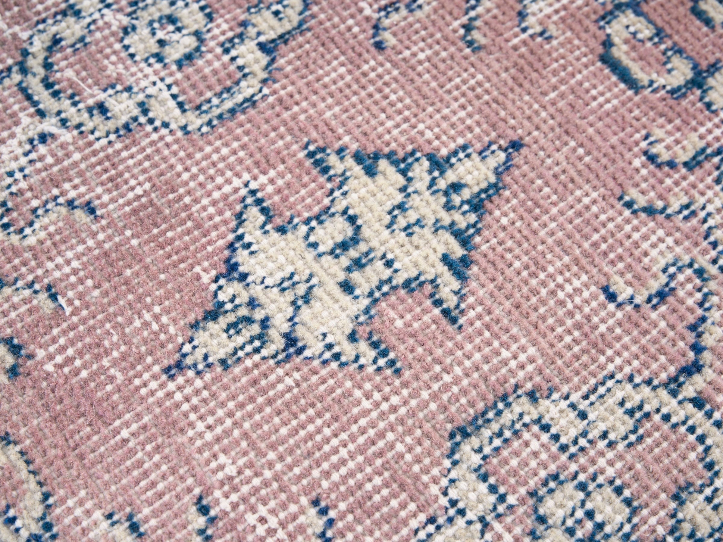 Turkish Isparta accent rug in muted pink and dusty blue, view 7 of 10