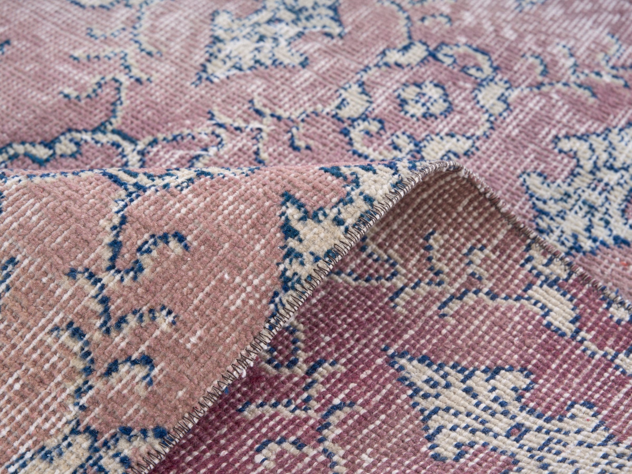 Turkish Isparta accent rug in muted pink and dusty blue, view 9 of 10