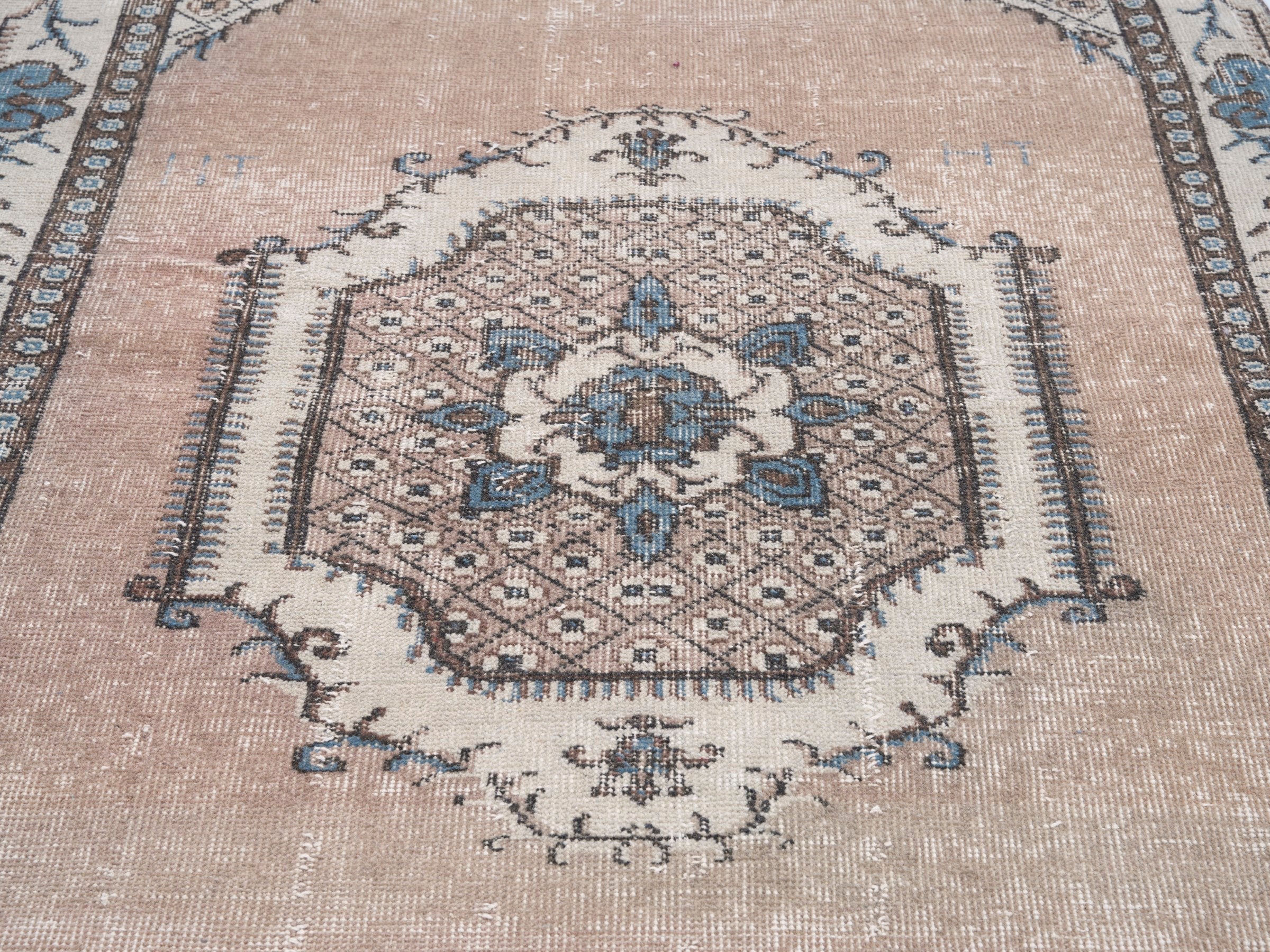 Turkish Isparta accent rug in muted pink and cream, view 4 of 9