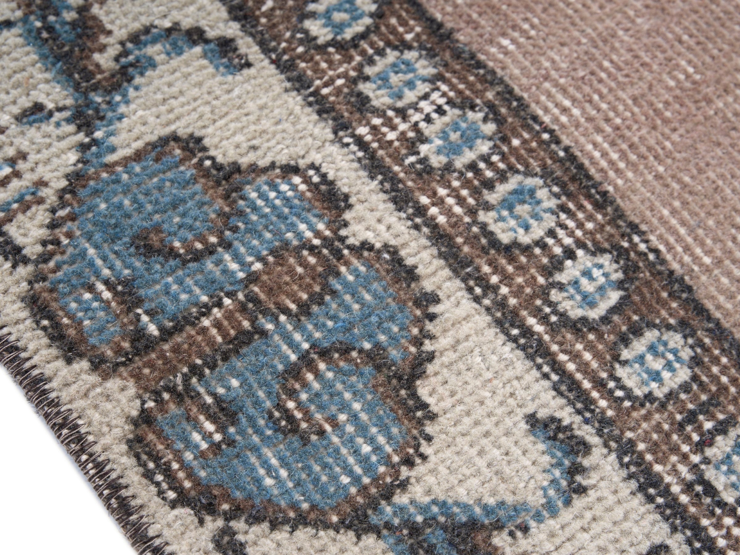 Turkish Isparta accent rug in muted pink and cream, view 6 of 9