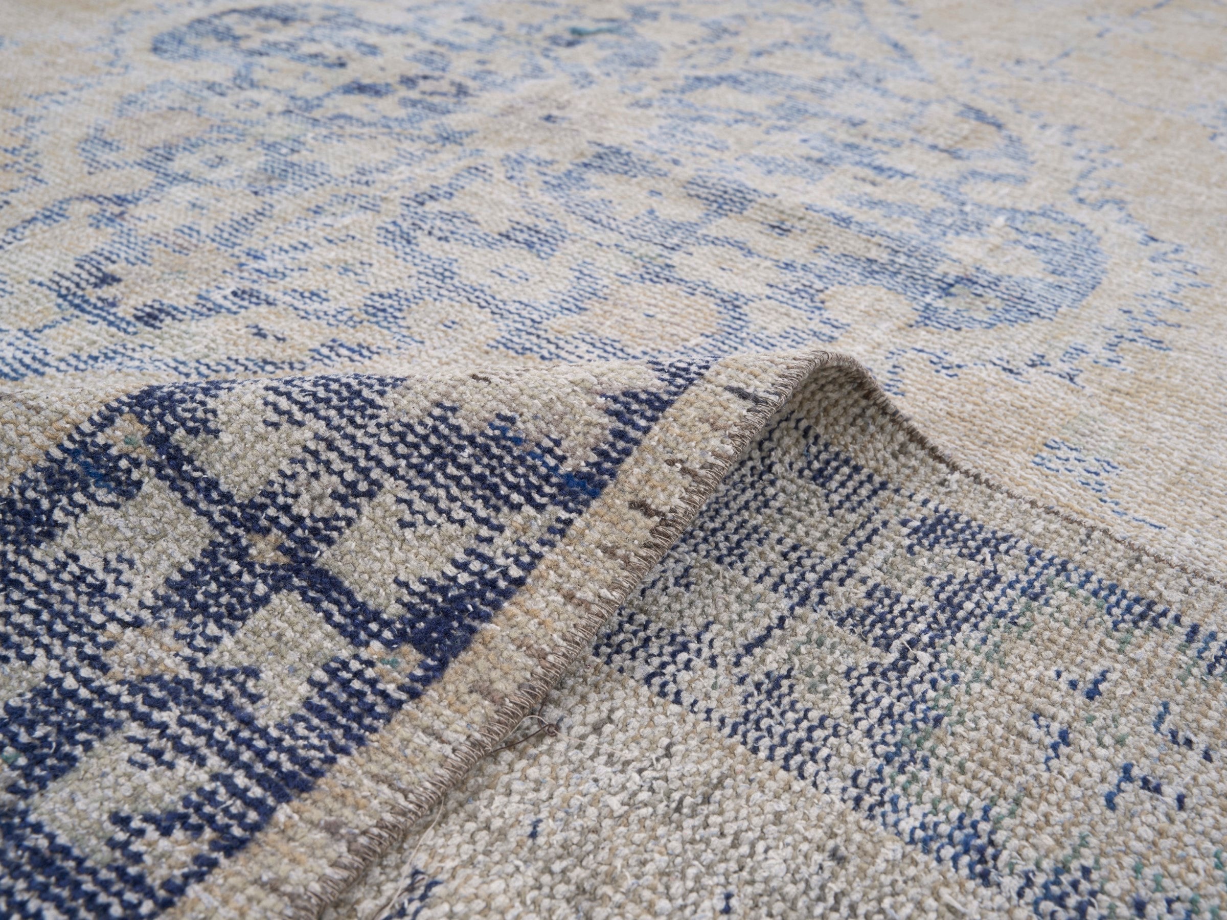 Turkish Manisa area rug in cream and navy, view 9 of 10