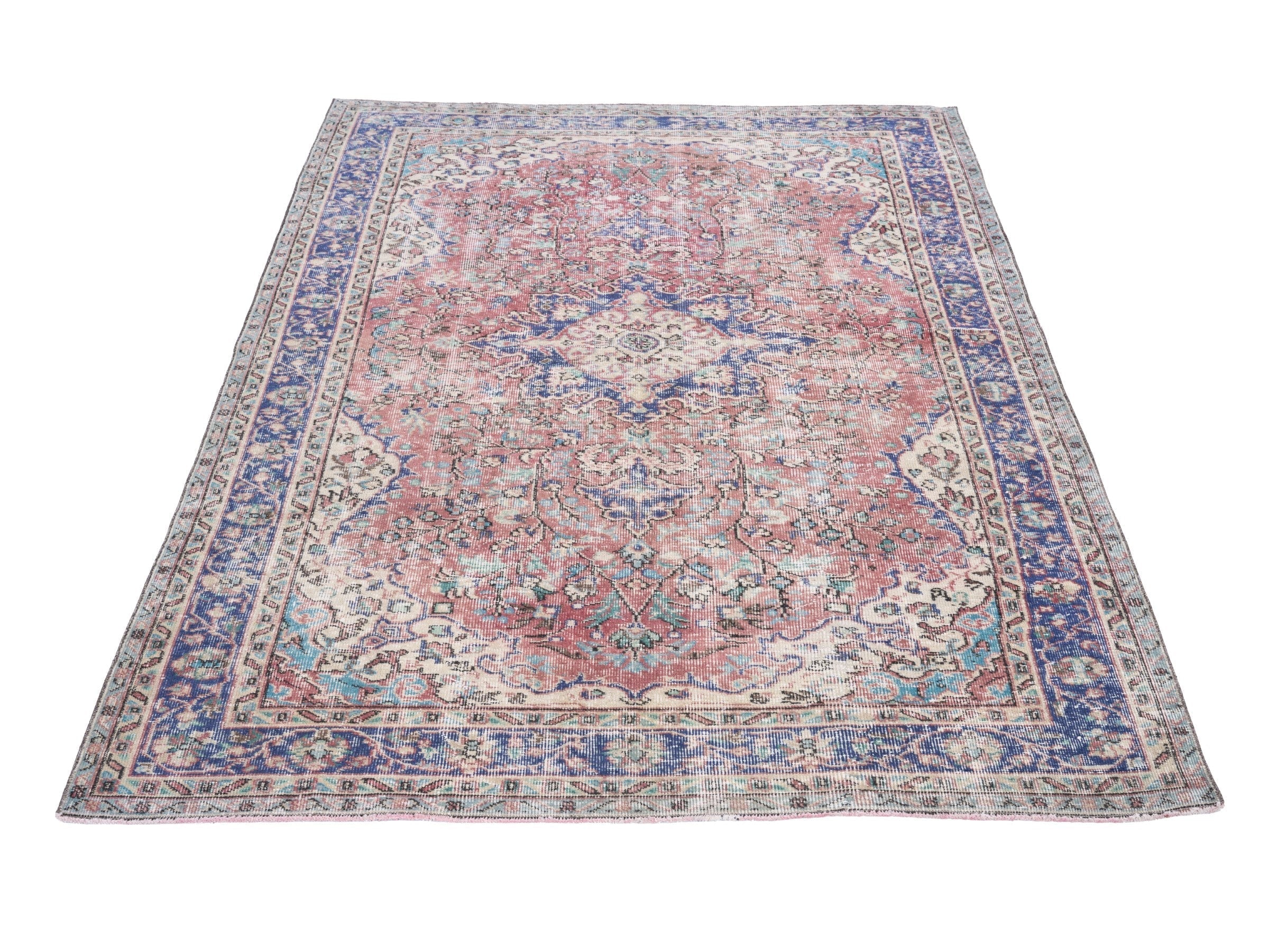 Turkish Isparta area rug in faded red and deep indigo, view 2 of 10