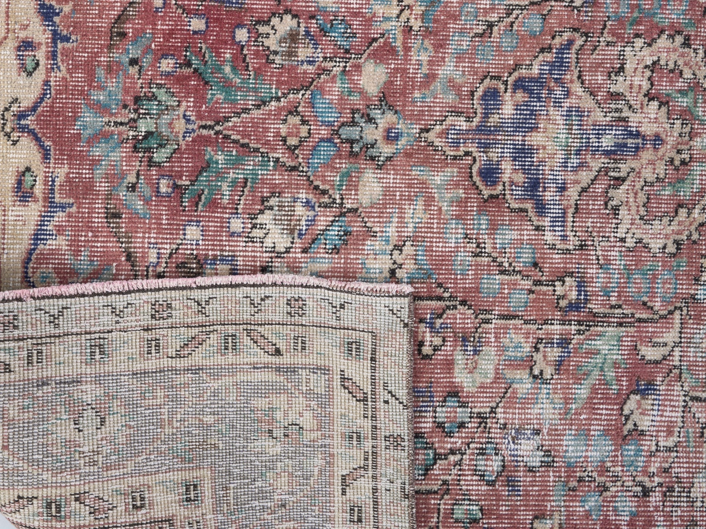 Turkish Isparta area rug in faded red and deep indigo, view 10 of 10