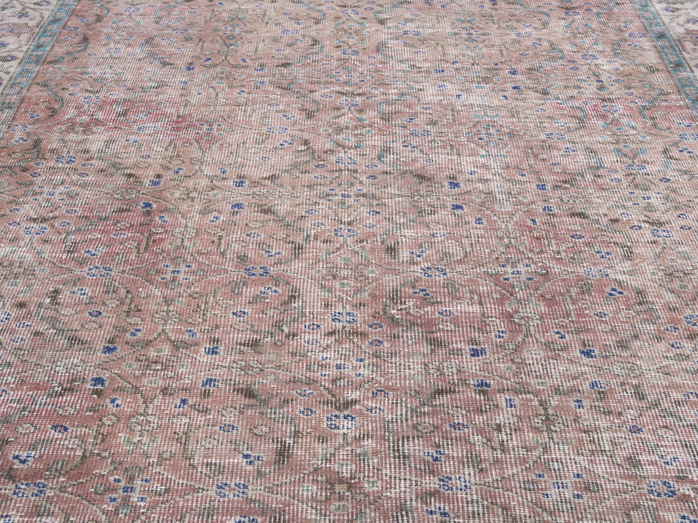 Turkish Isparta area rug in faded red and cream, view 4 of 9