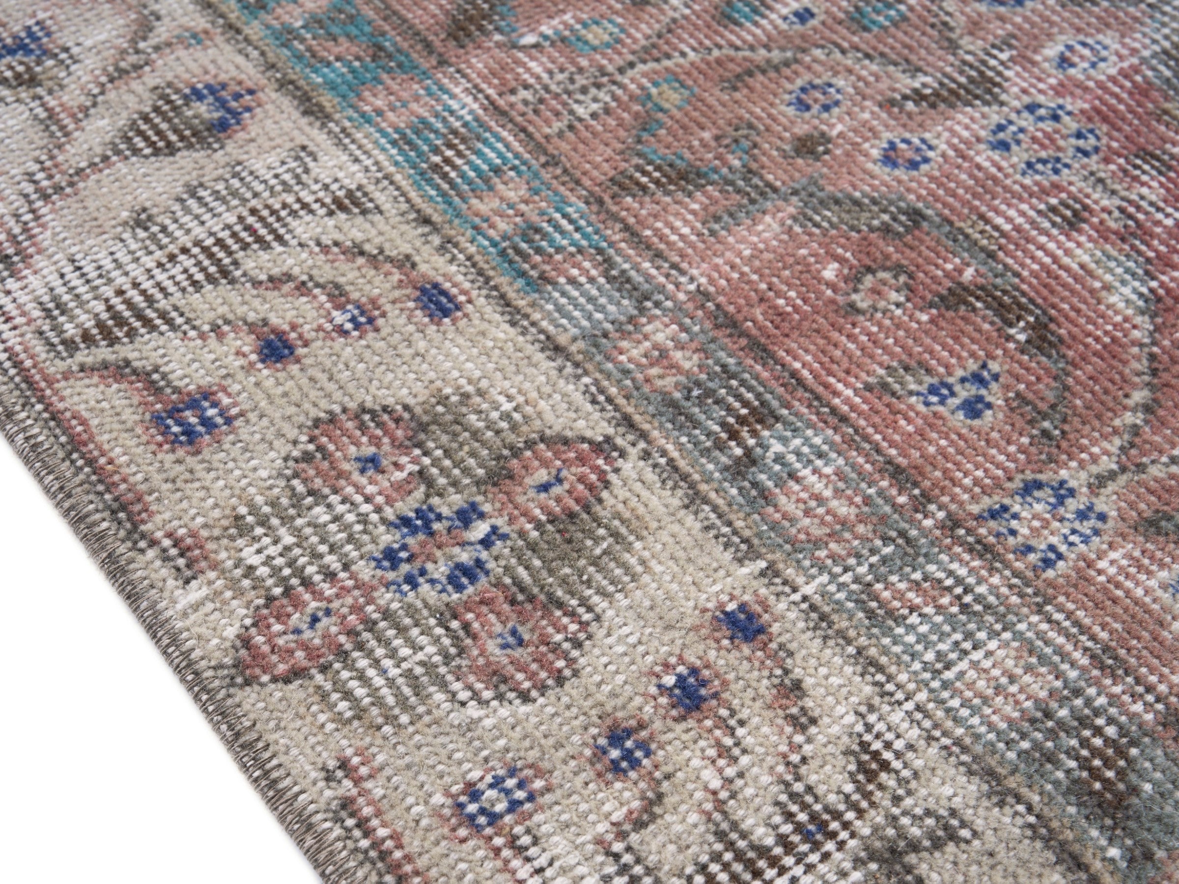 Turkish Isparta area rug in faded red and cream, view 6 of 9
