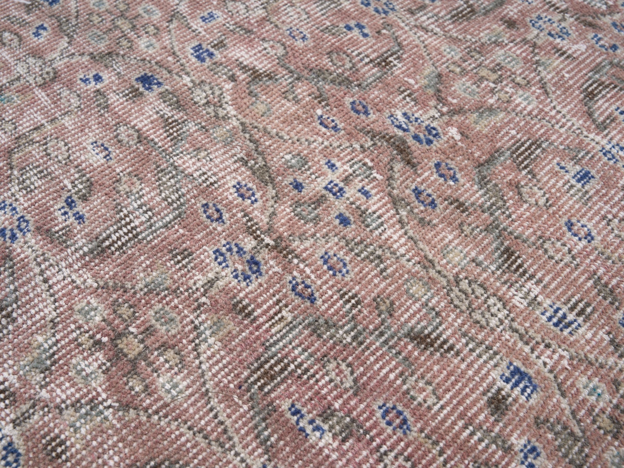 Turkish Isparta area rug in faded red and cream, view 7 of 9