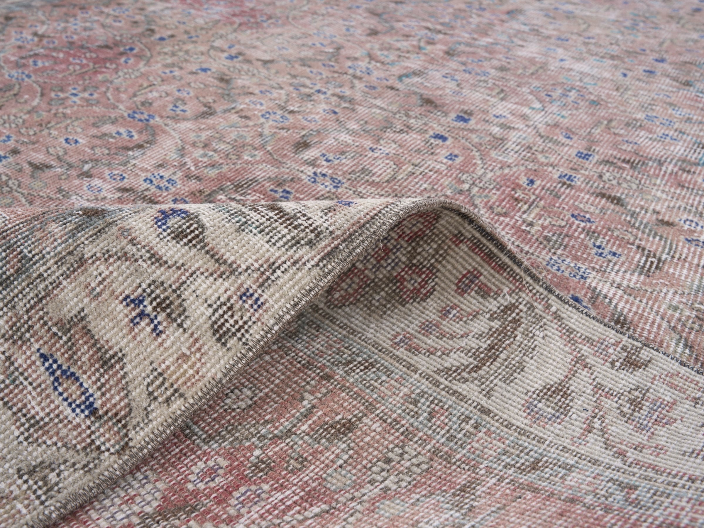 Turkish Isparta area rug in faded red and cream, view 9 of 9
