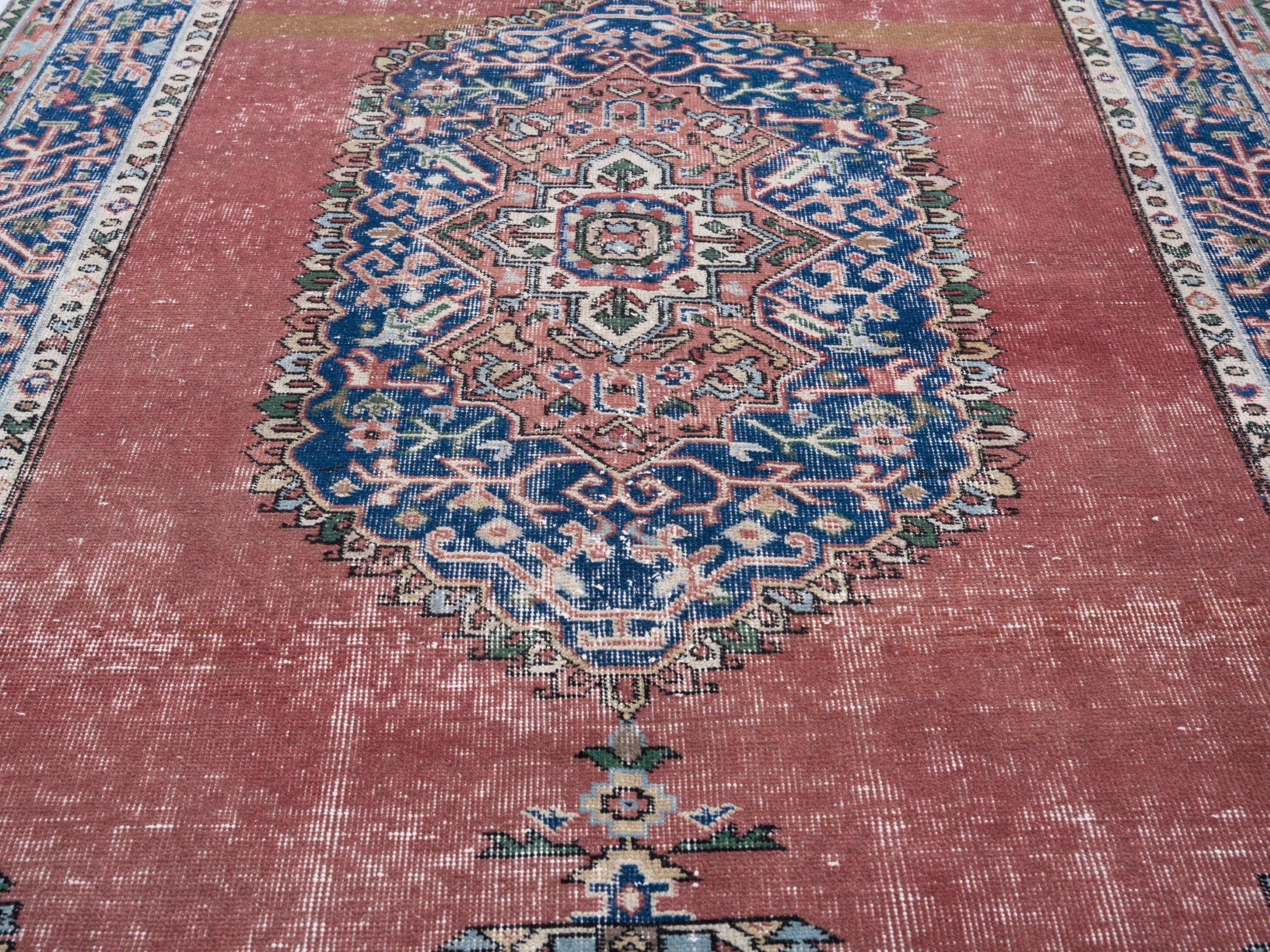 Turkish Isparta area rug in dusty rose and navy, view 4 of 10