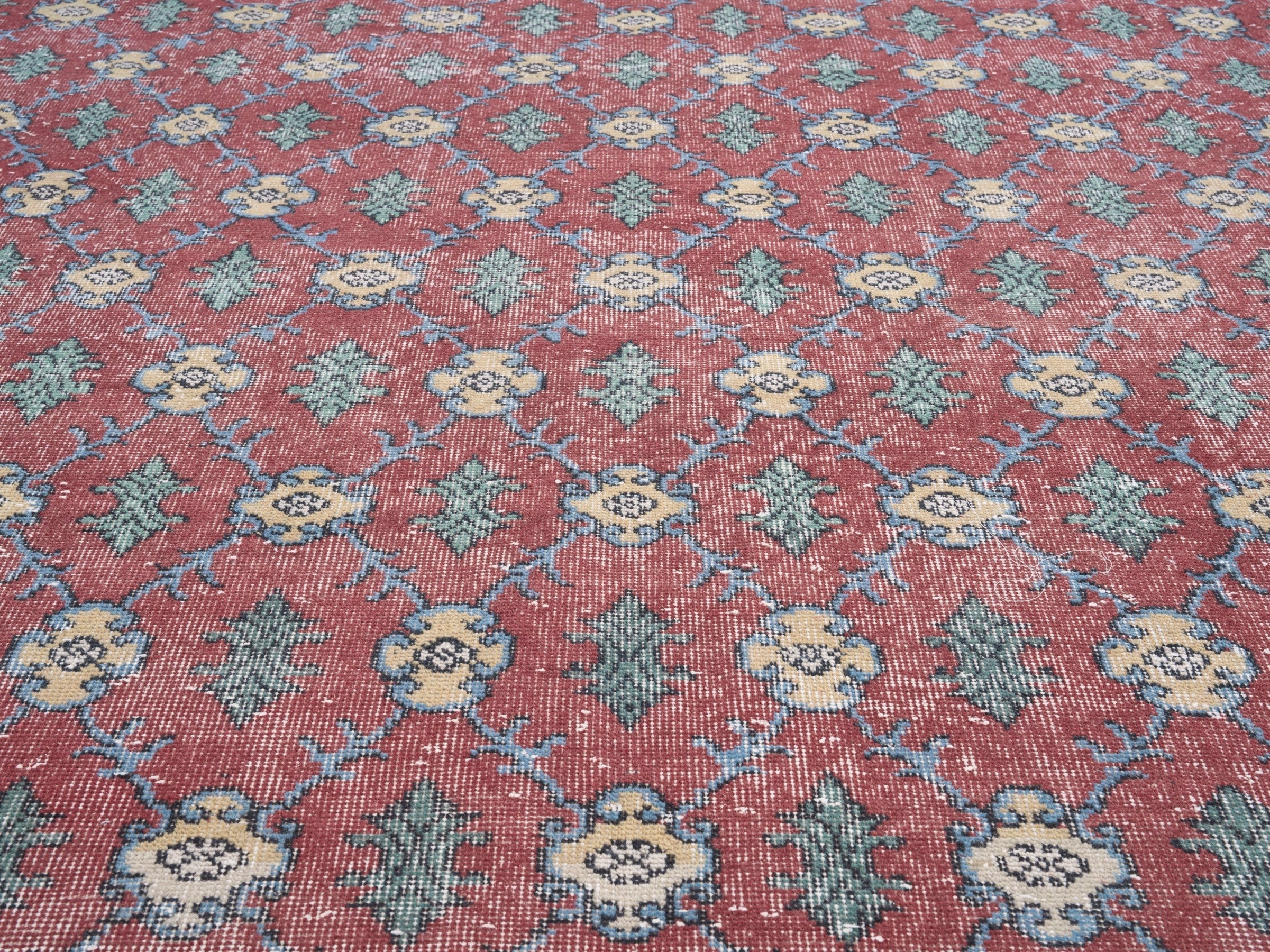 Turkish Isparta area rug in faded red and sage, view 4 of 10