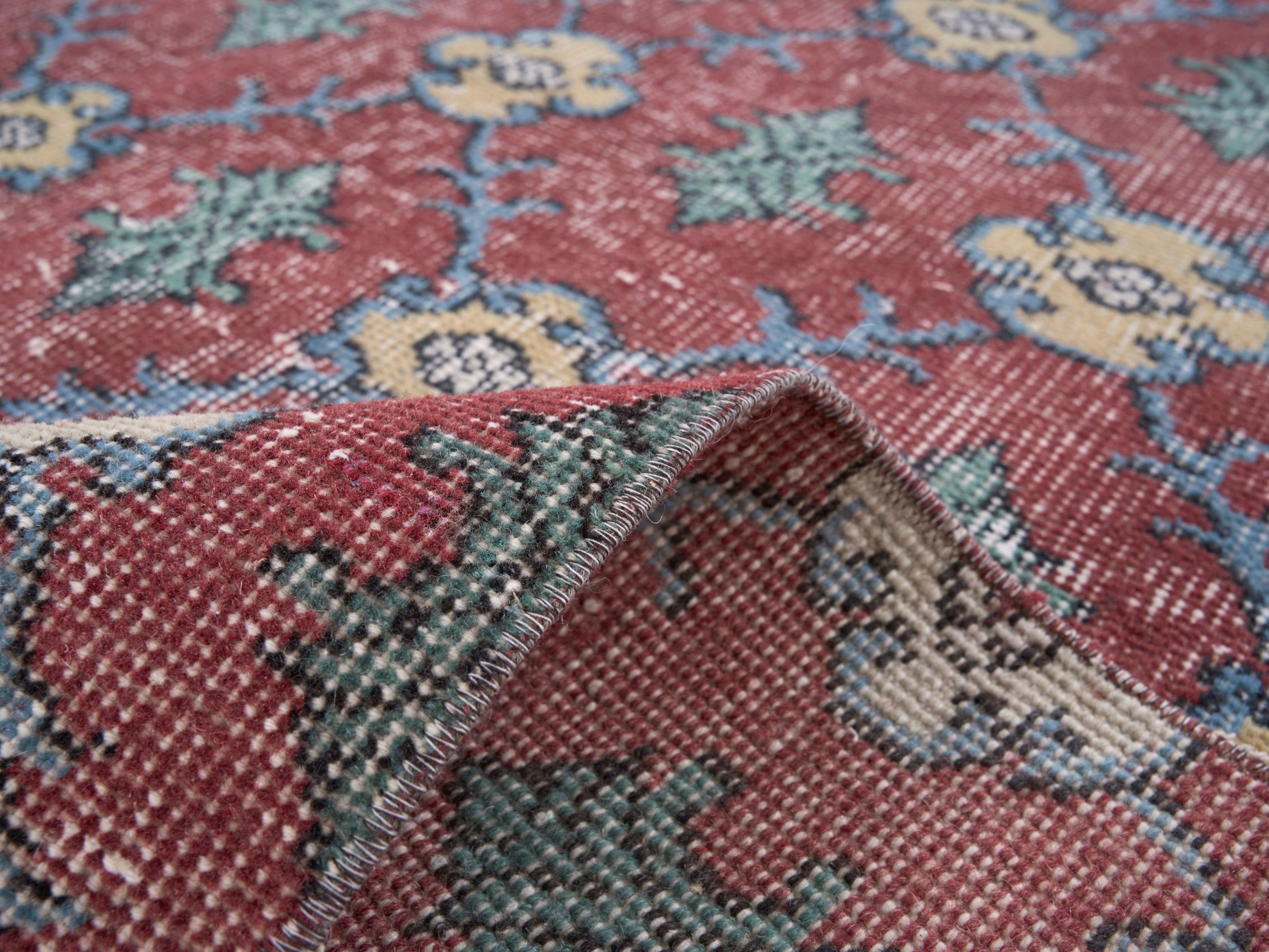 Turkish Isparta area rug in faded red and sage, view 9 of 10