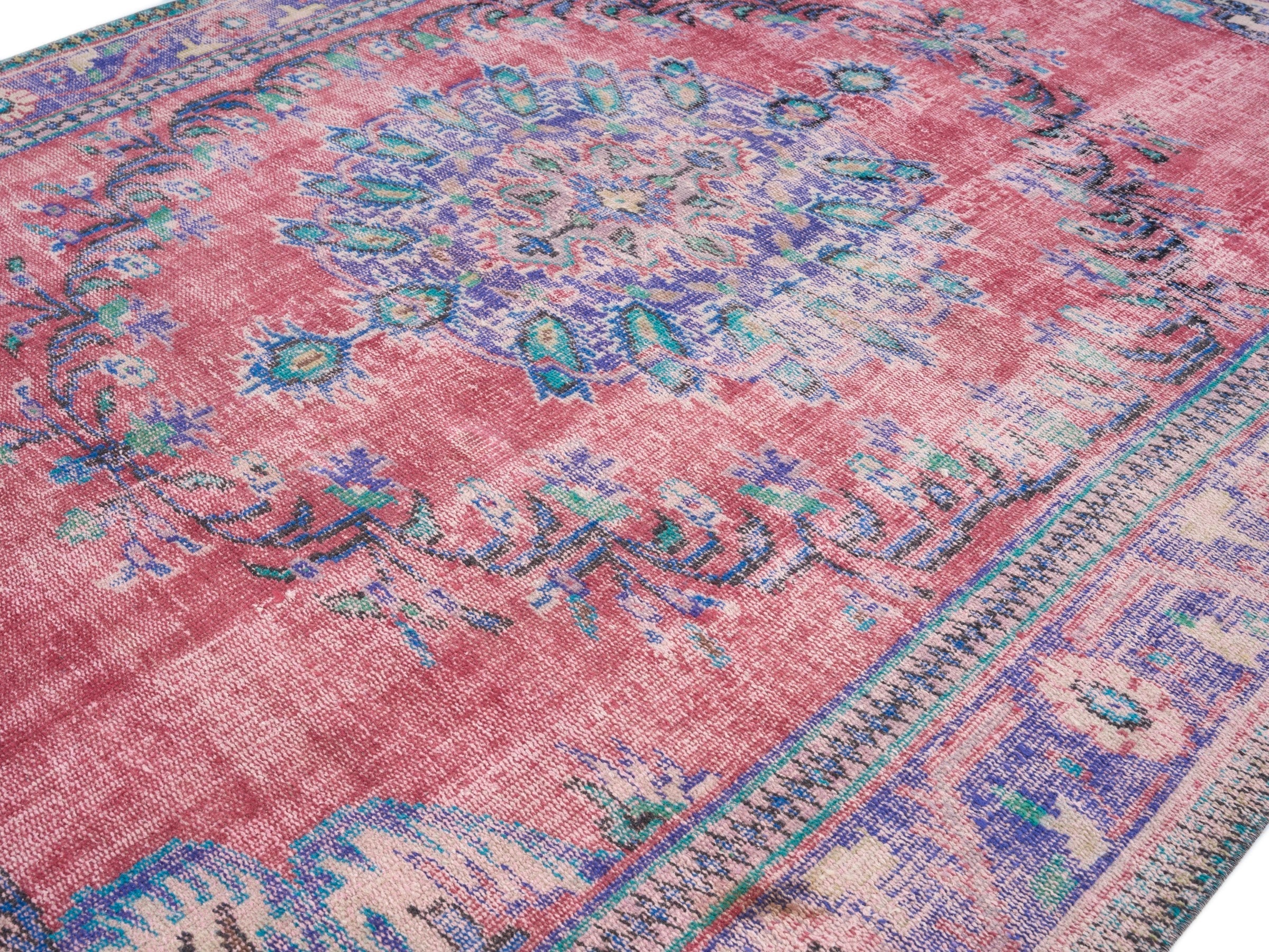 Turkish Manisa area rug in faded red and plum, view 5 of 10