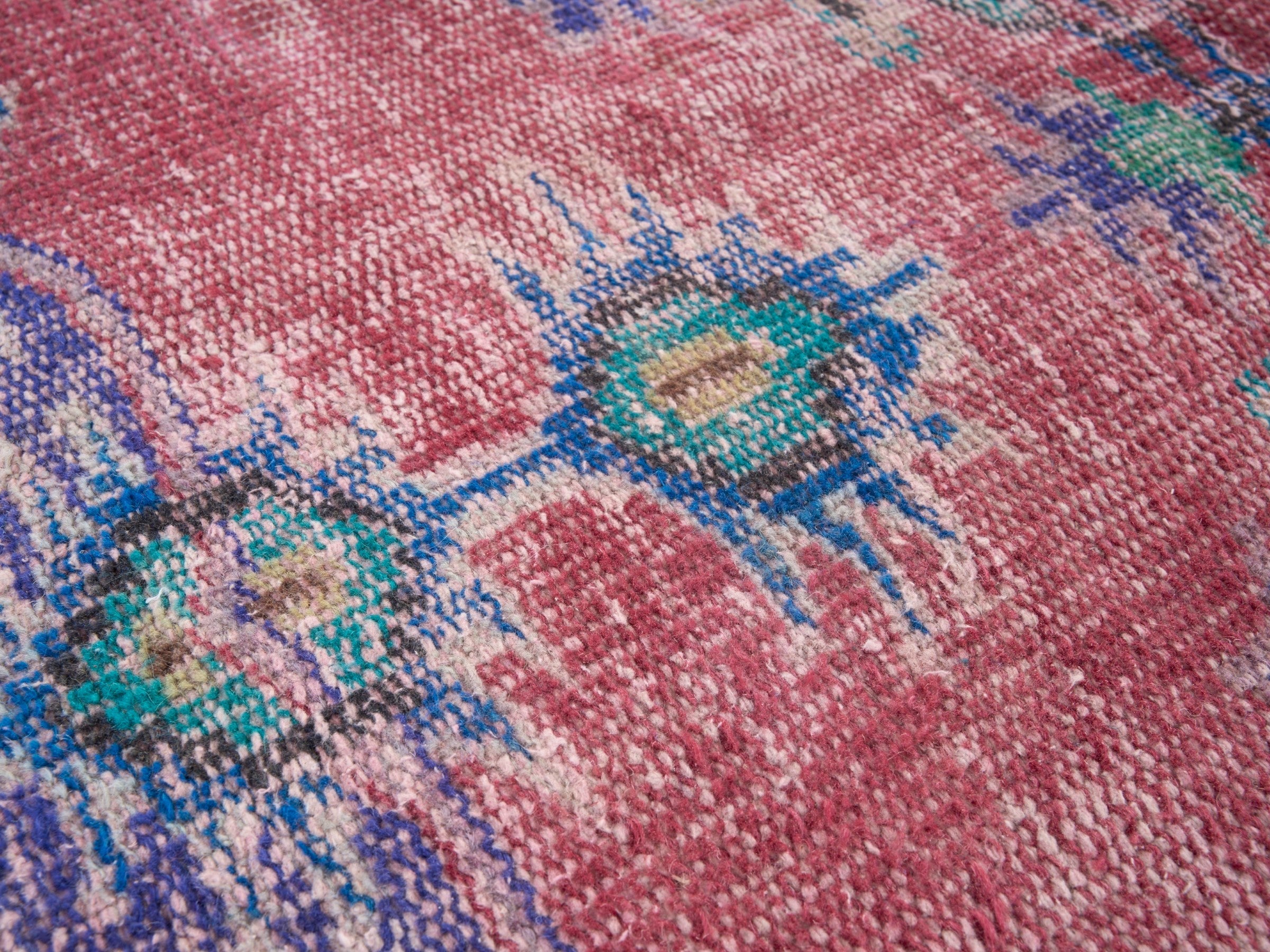Turkish Manisa area rug in faded red and plum, view 7 of 10