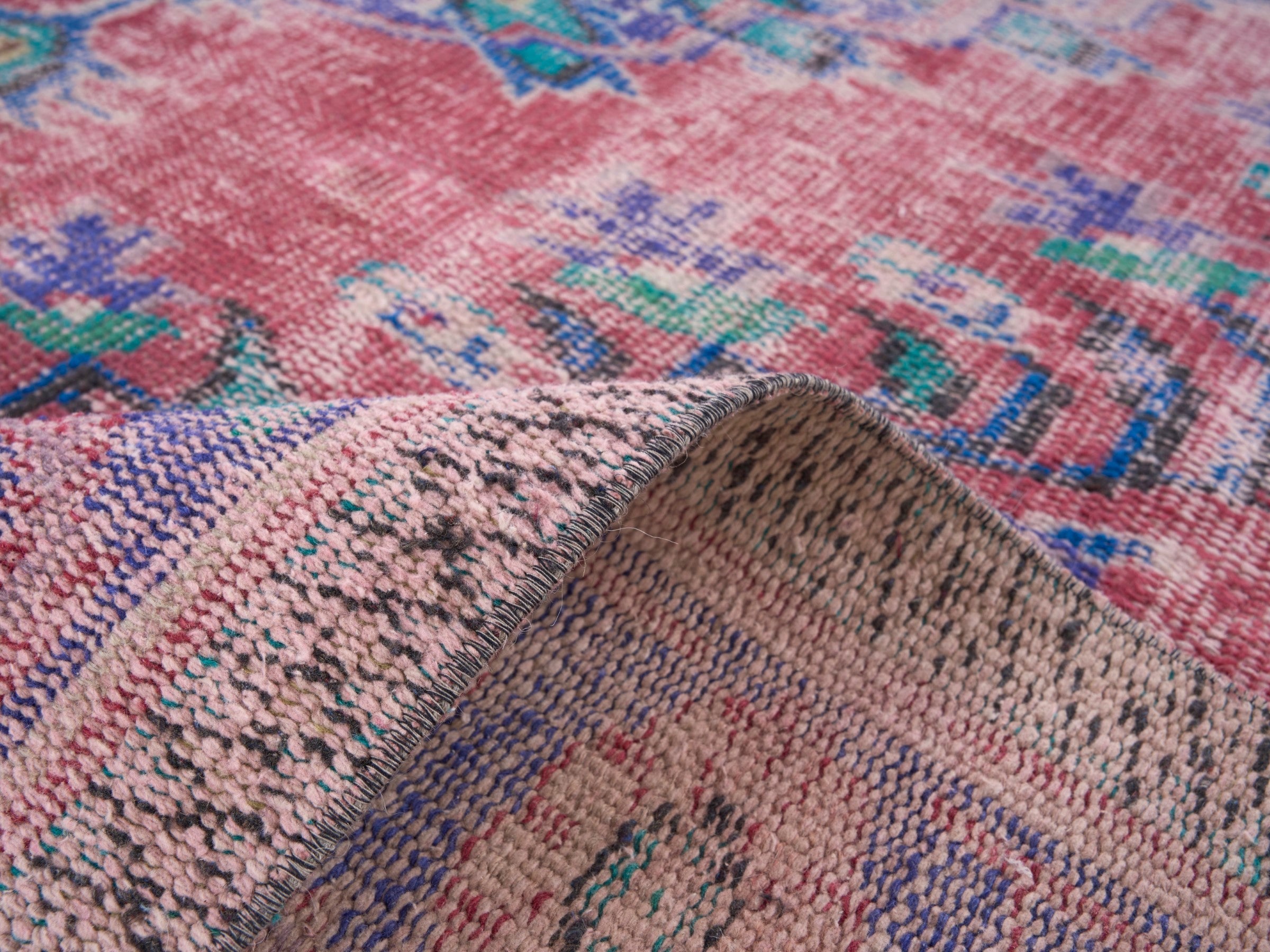 Turkish Manisa area rug in faded red and plum, view 9 of 10
