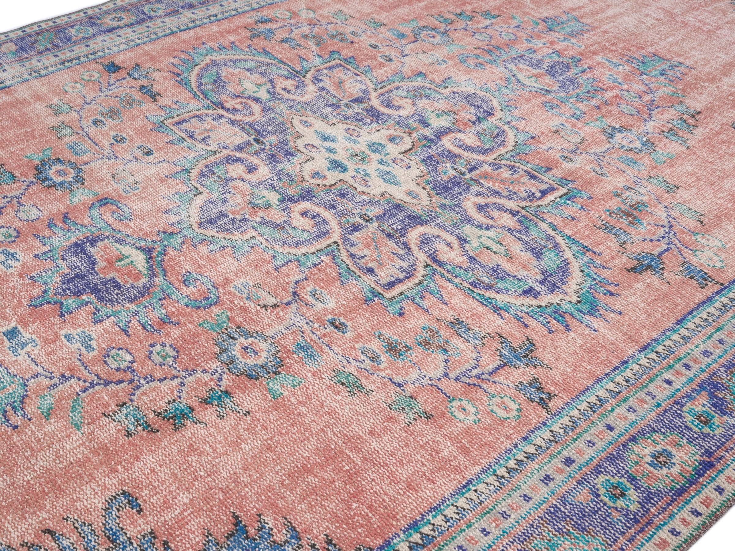 Turkish Manisa area rug in dusty rose and slate blue, view 5 of 10