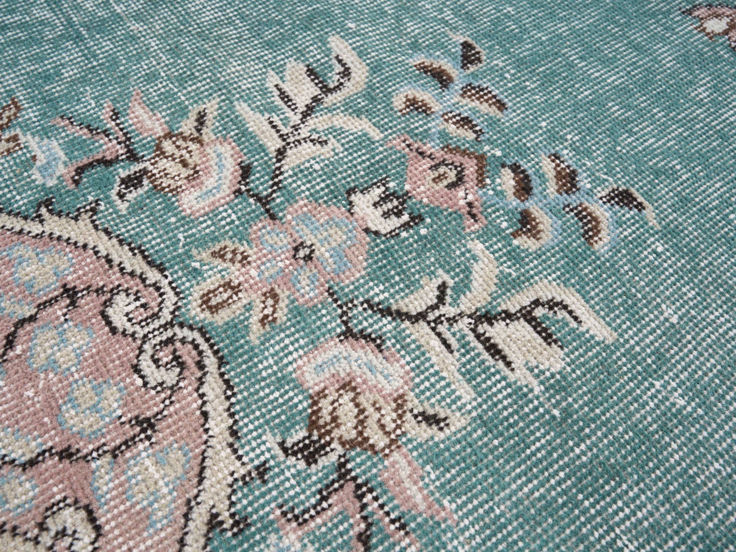 Turkish Isparta area rug in turquoise and muted pink, view 7 of 10