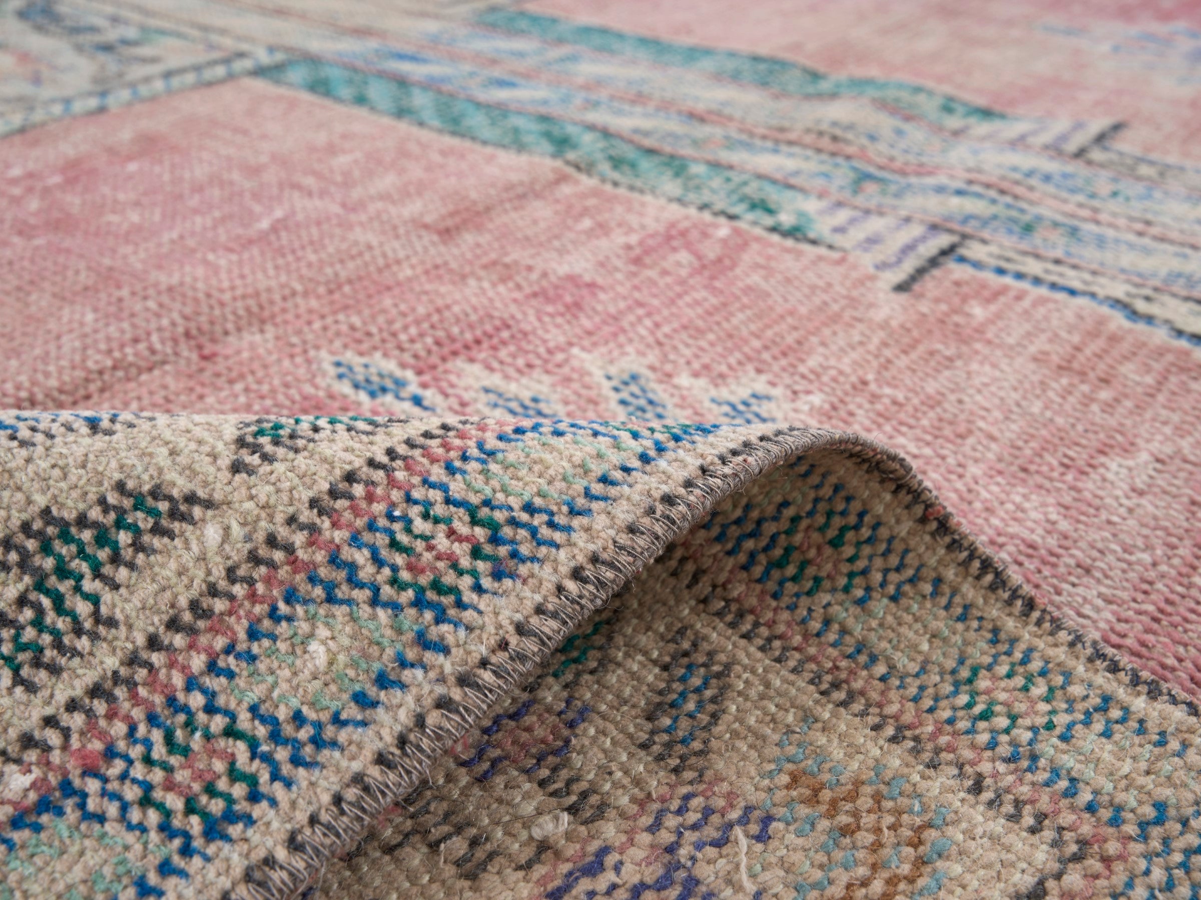 Turkish Isparta area rug in muted pink and cream, view 9 of 10