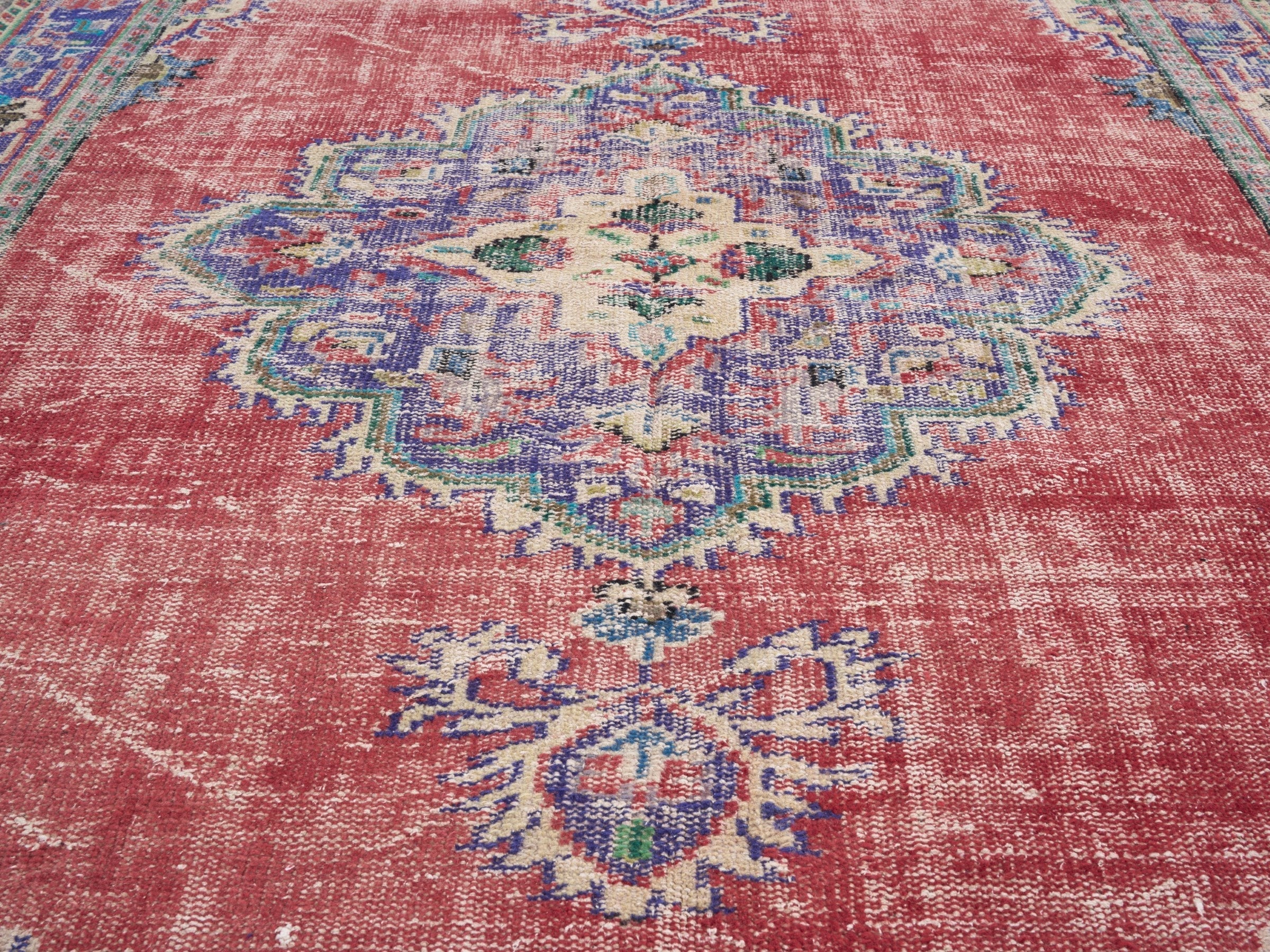 Turkish Manisa area rug in faded red and dark blue, view 4 of 10