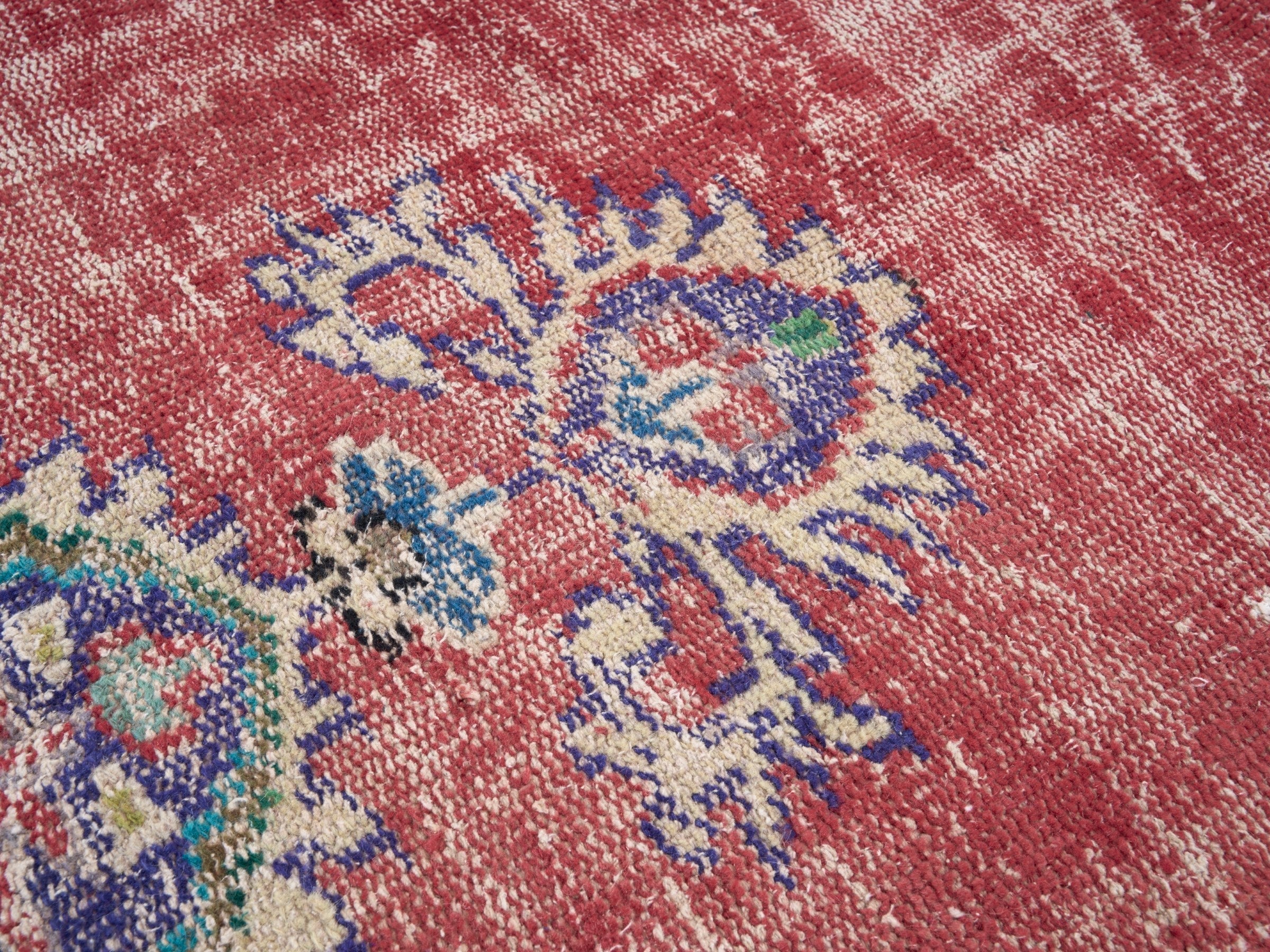 Turkish Manisa area rug in faded red and dark blue, view 7 of 10
