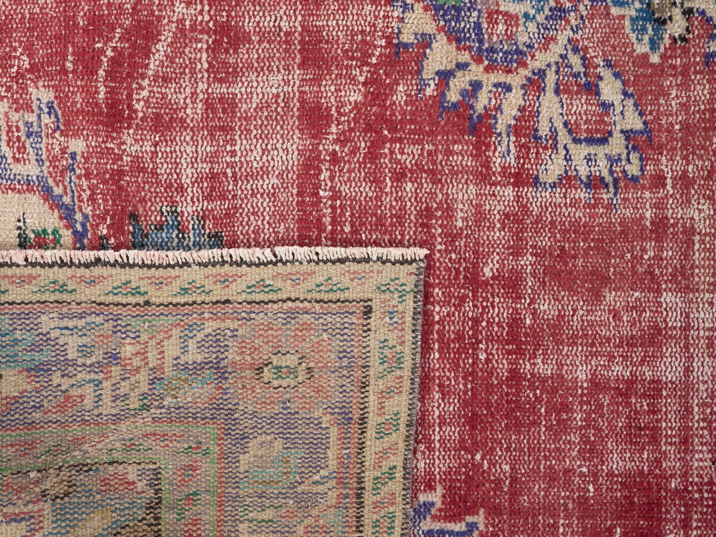 Turkish Manisa area rug in faded red and dark blue, view 10 of 10