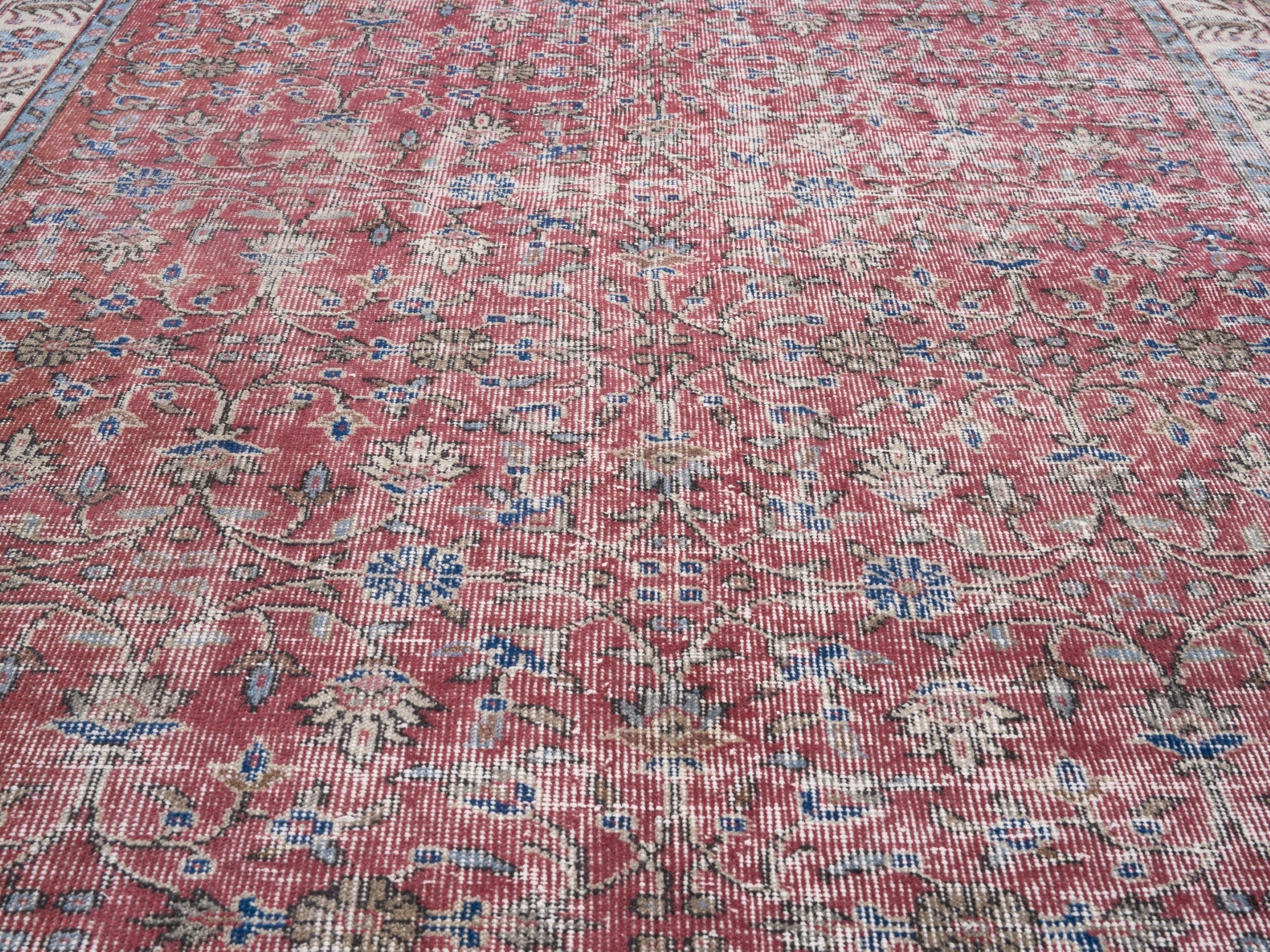 Turkish Isparta area rug in faded red and cream, view 4 of 10