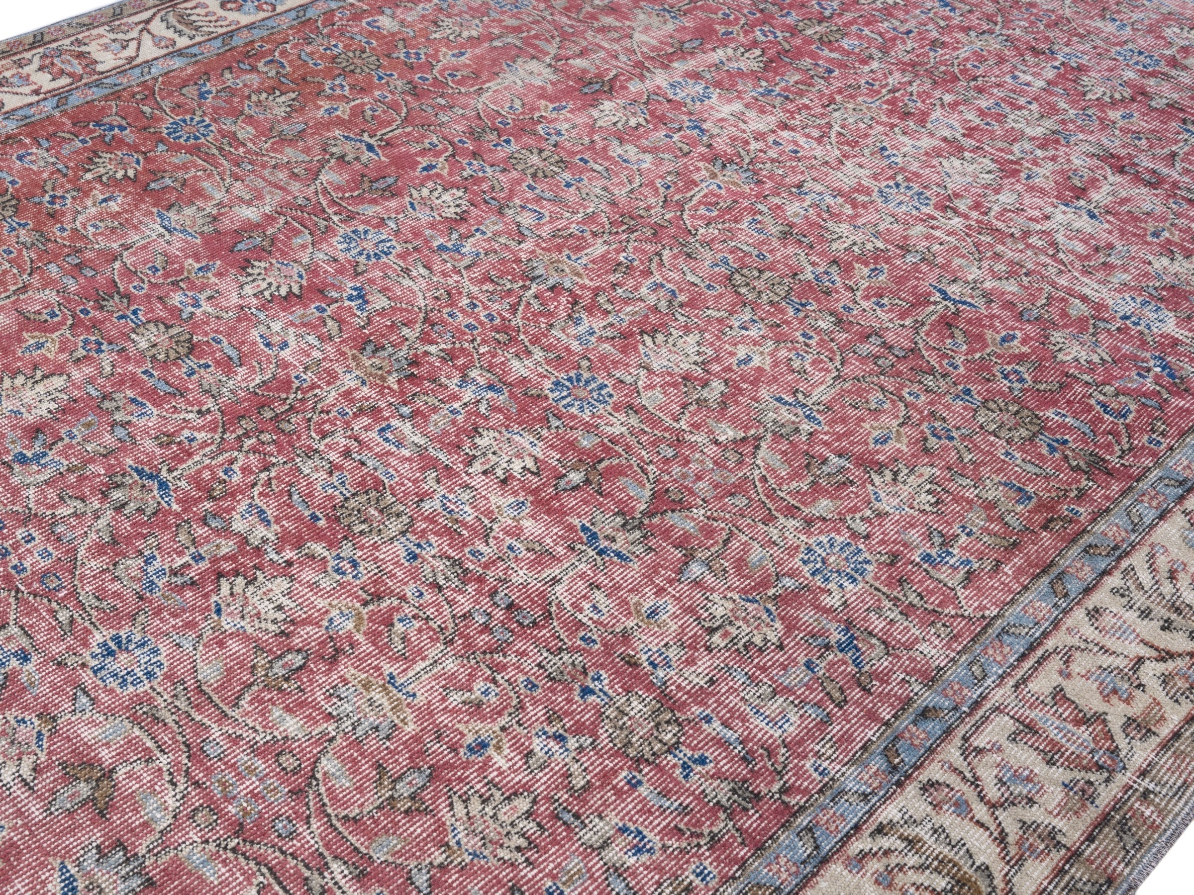 Turkish Isparta area rug in faded red and cream, view 5 of 10