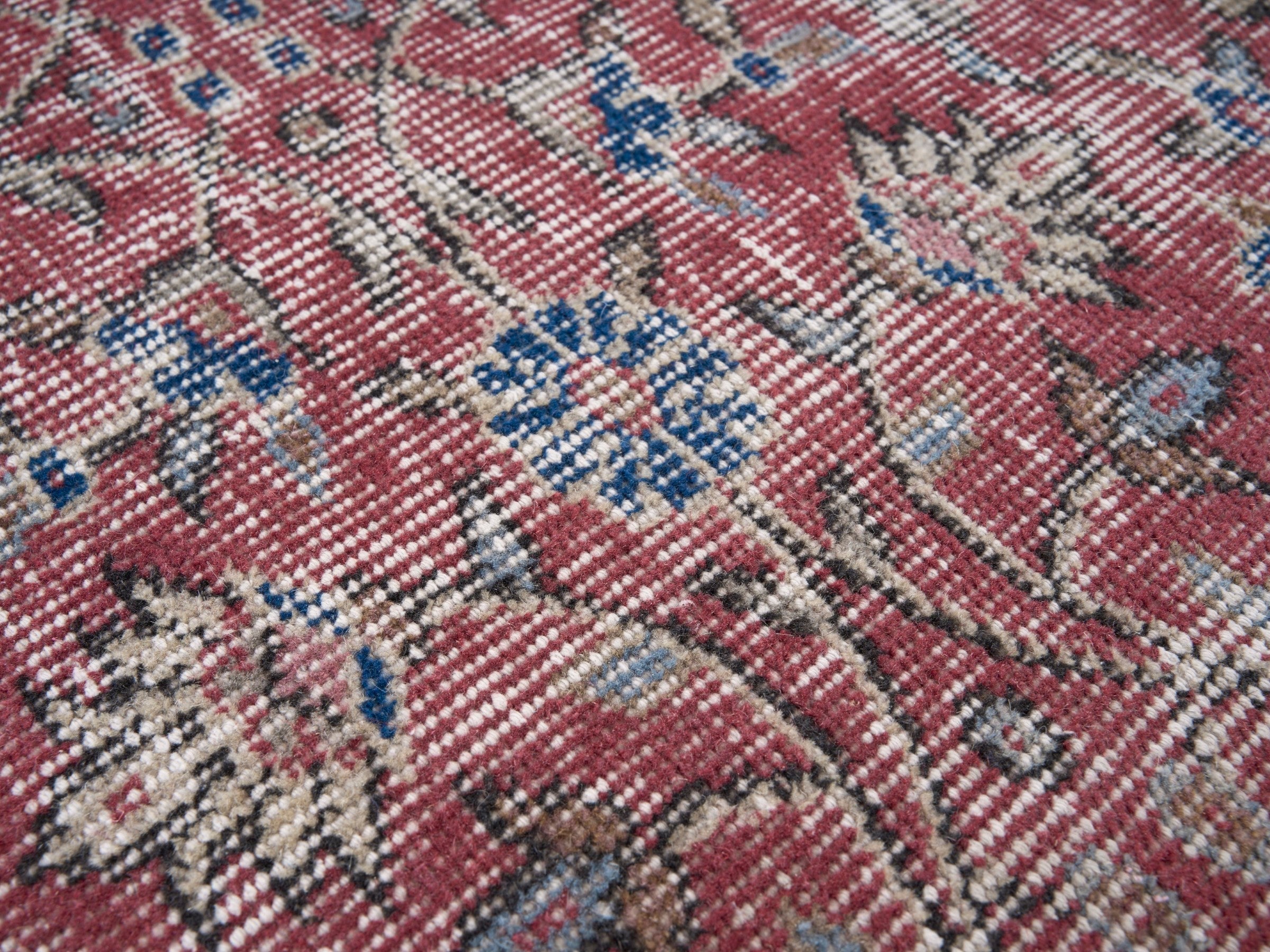 Turkish Isparta area rug in faded red and cream, view 7 of 10