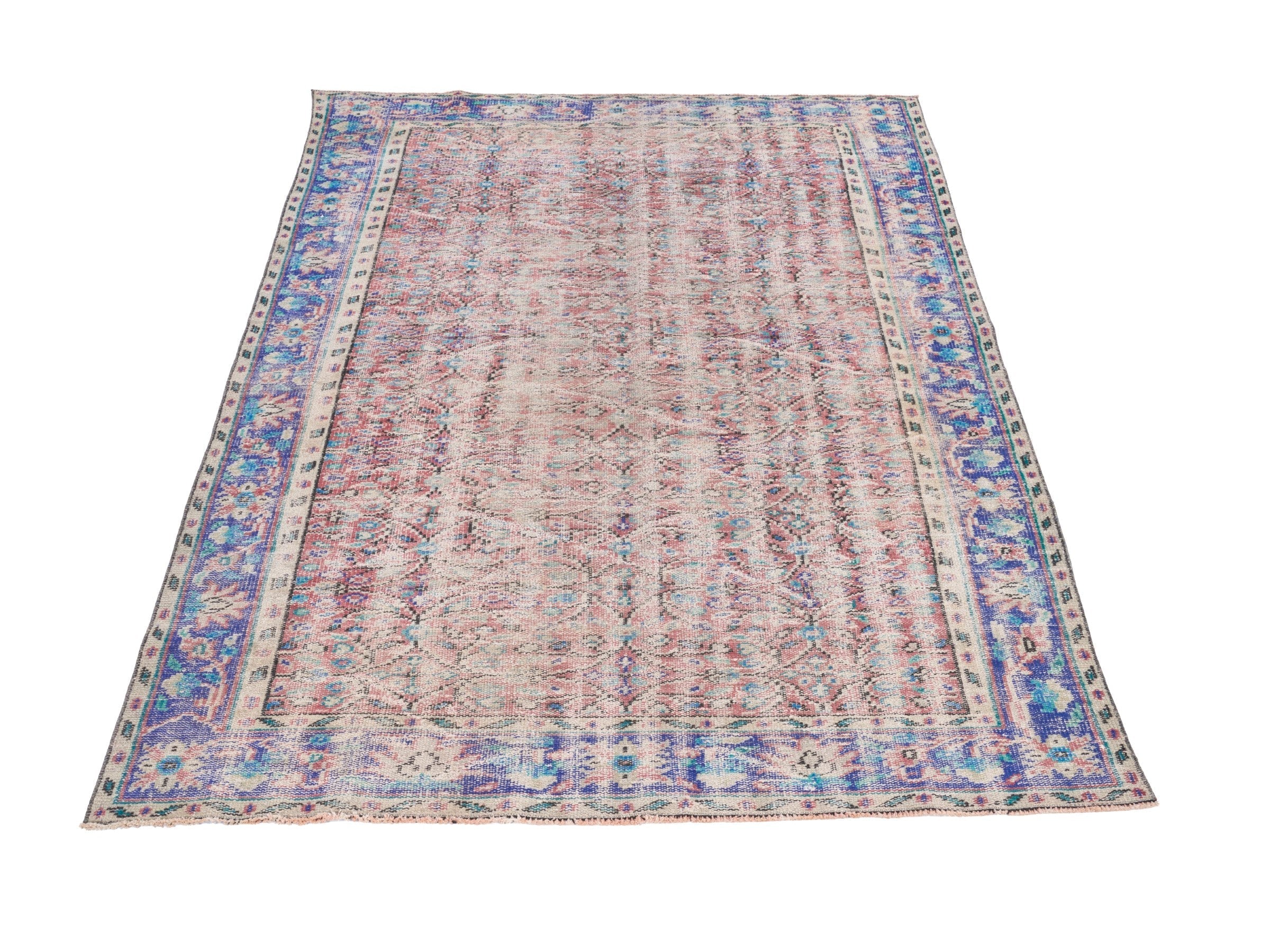 Turkish Manisa area rug in muted pink and navy, view 2 of 10