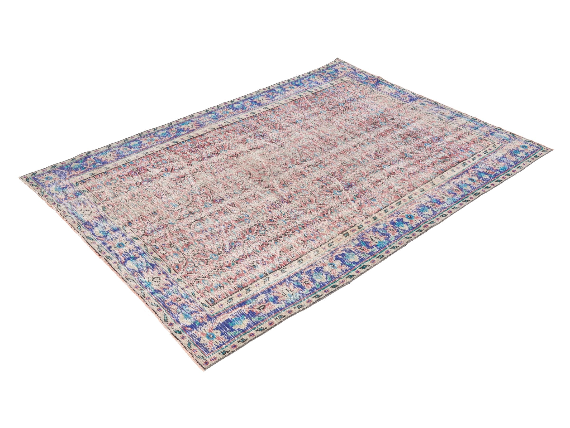 Turkish Manisa area rug in muted pink and navy, view 3 of 10