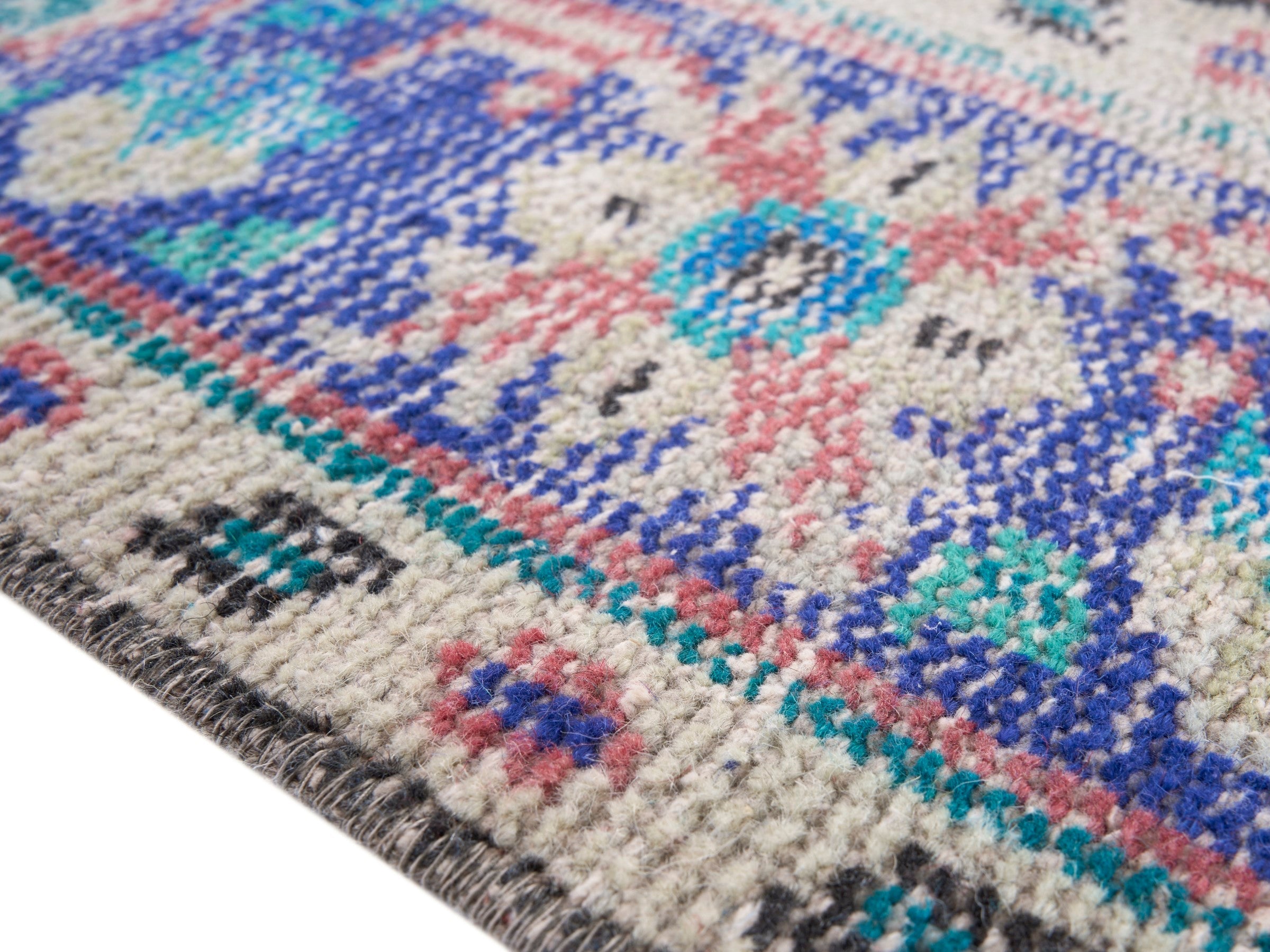 Turkish Manisa area rug in muted pink and navy, view 6 of 10