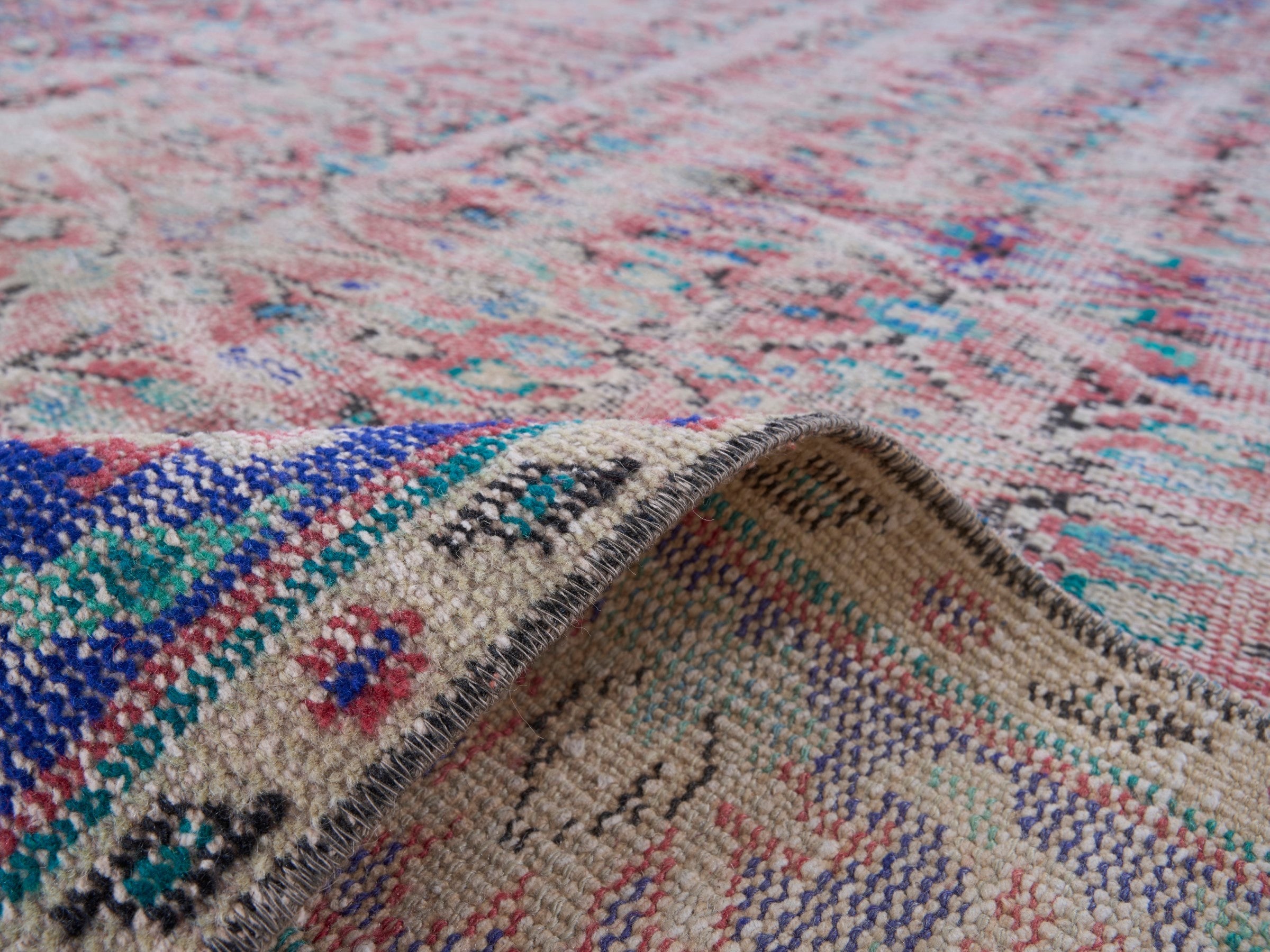Turkish Manisa area rug in muted pink and navy, view 9 of 10