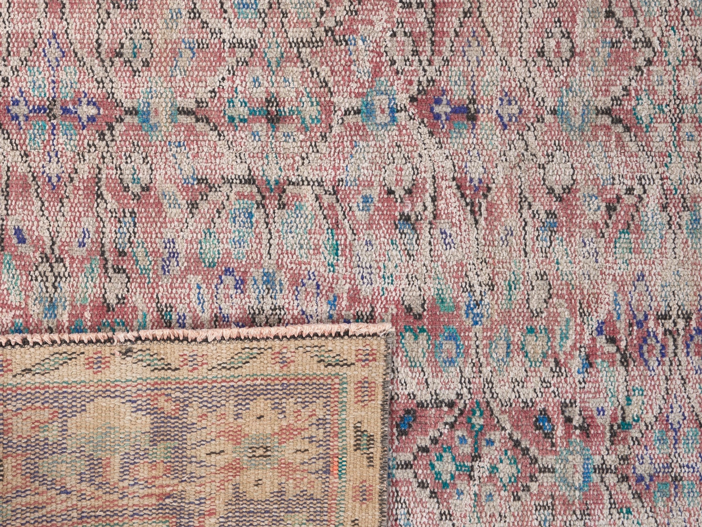 Turkish Manisa area rug in muted pink and navy, view 10 of 10