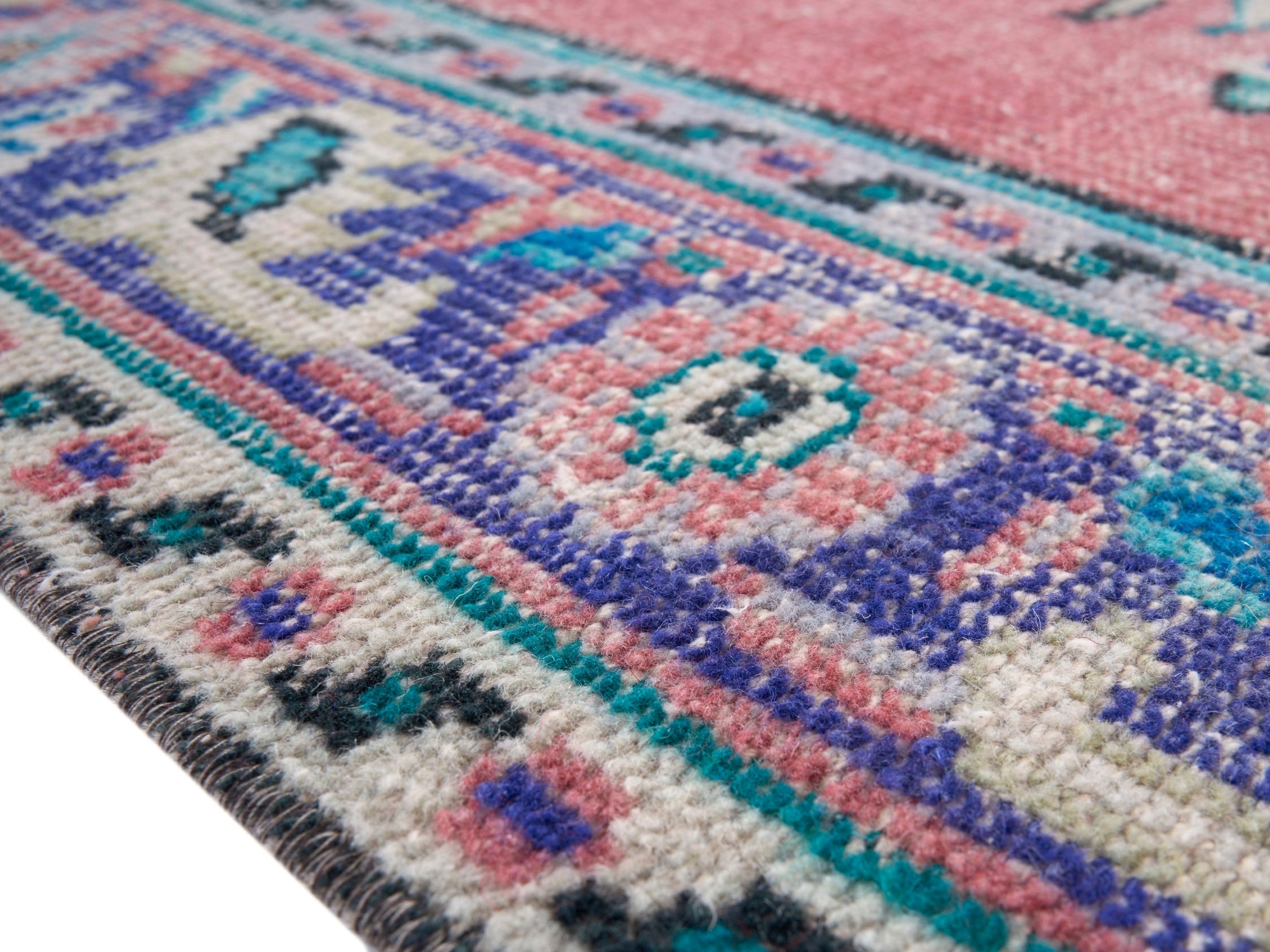 Turkish Manisa area rug in dusty rose and muted pink, view 6 of 10