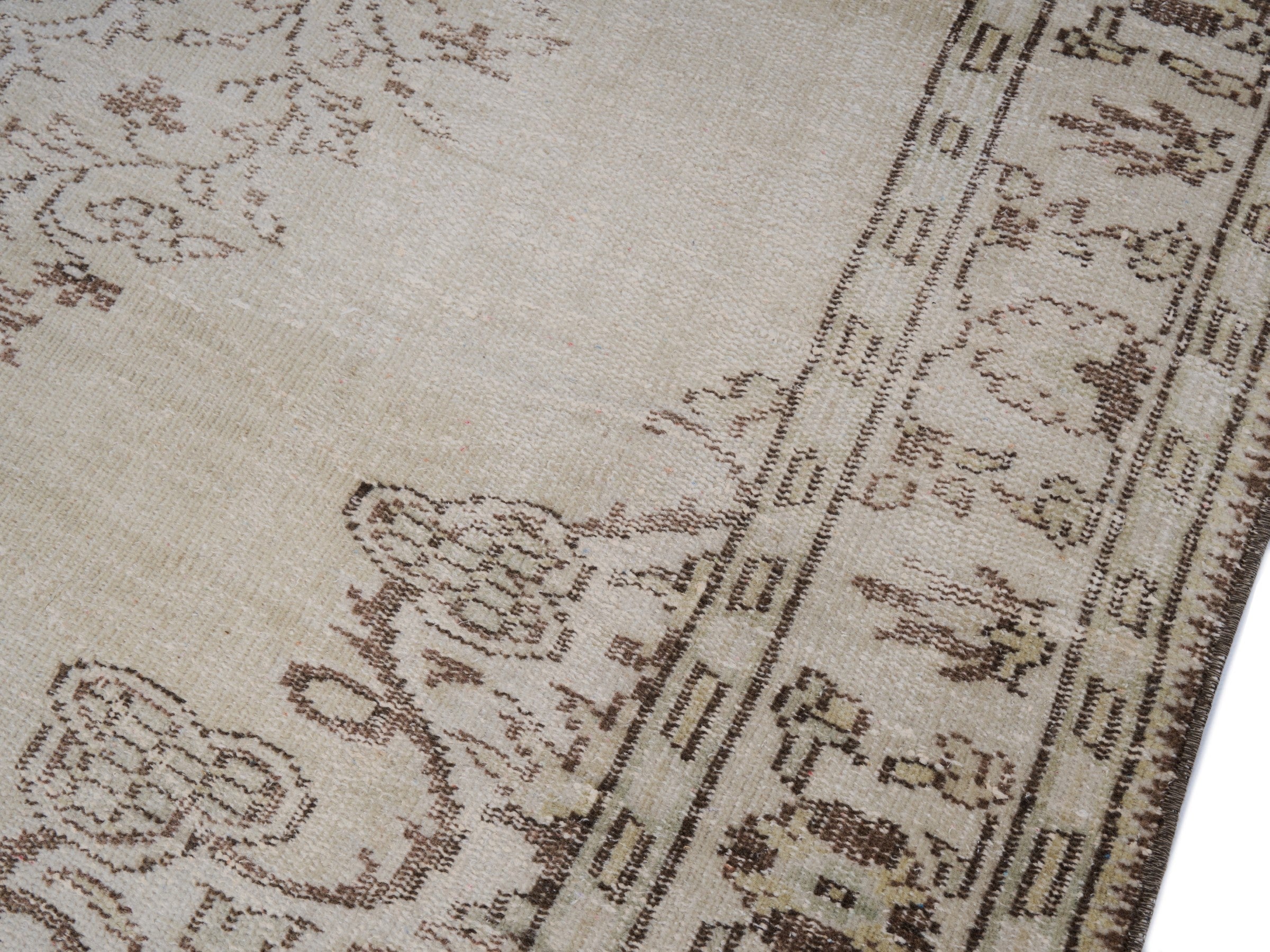 Turkish Manisa area rug in cream and faded red, view 4 of 10