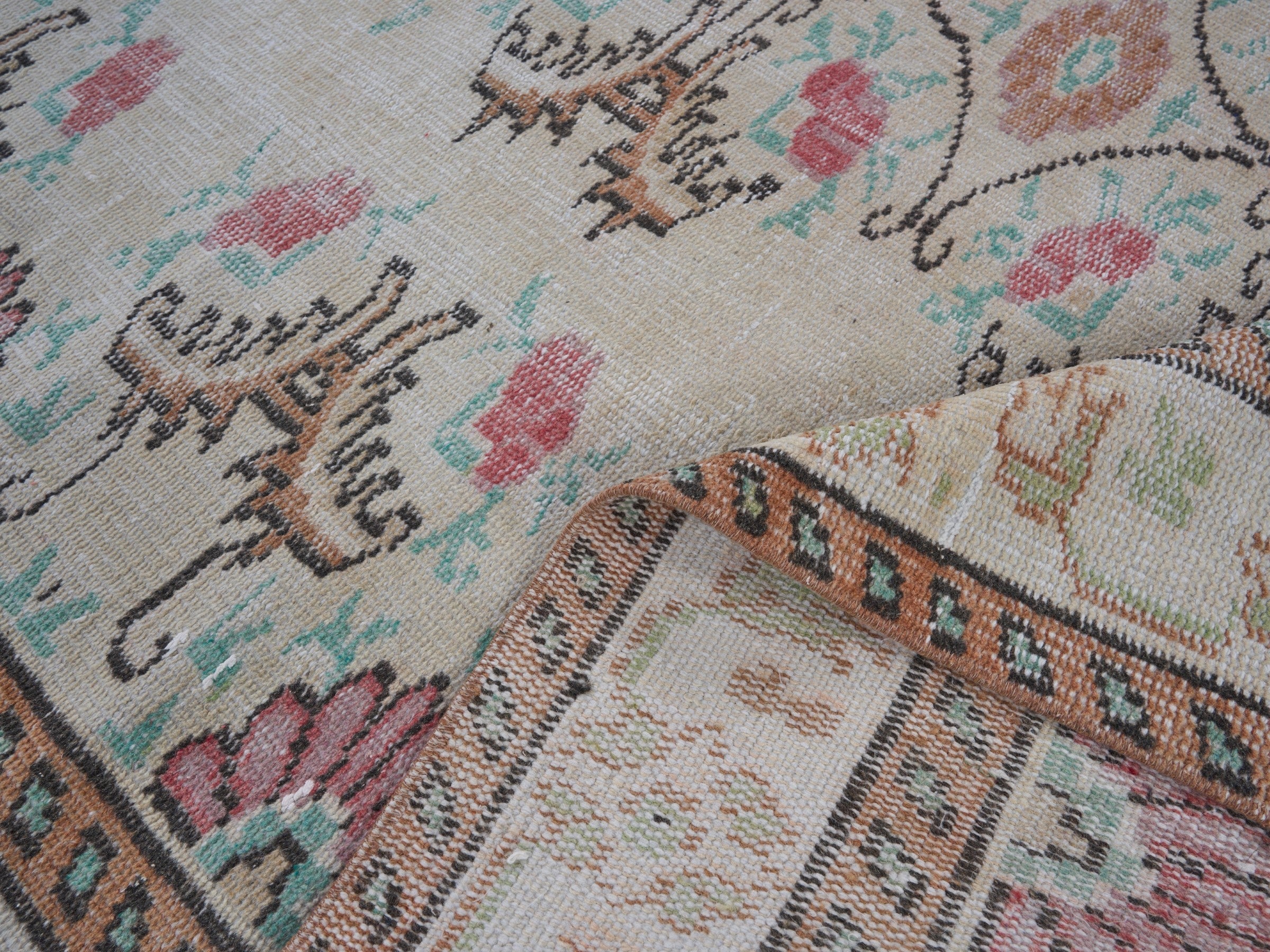 Turkish Manisa area rug in cream and rose, view 9 of 10