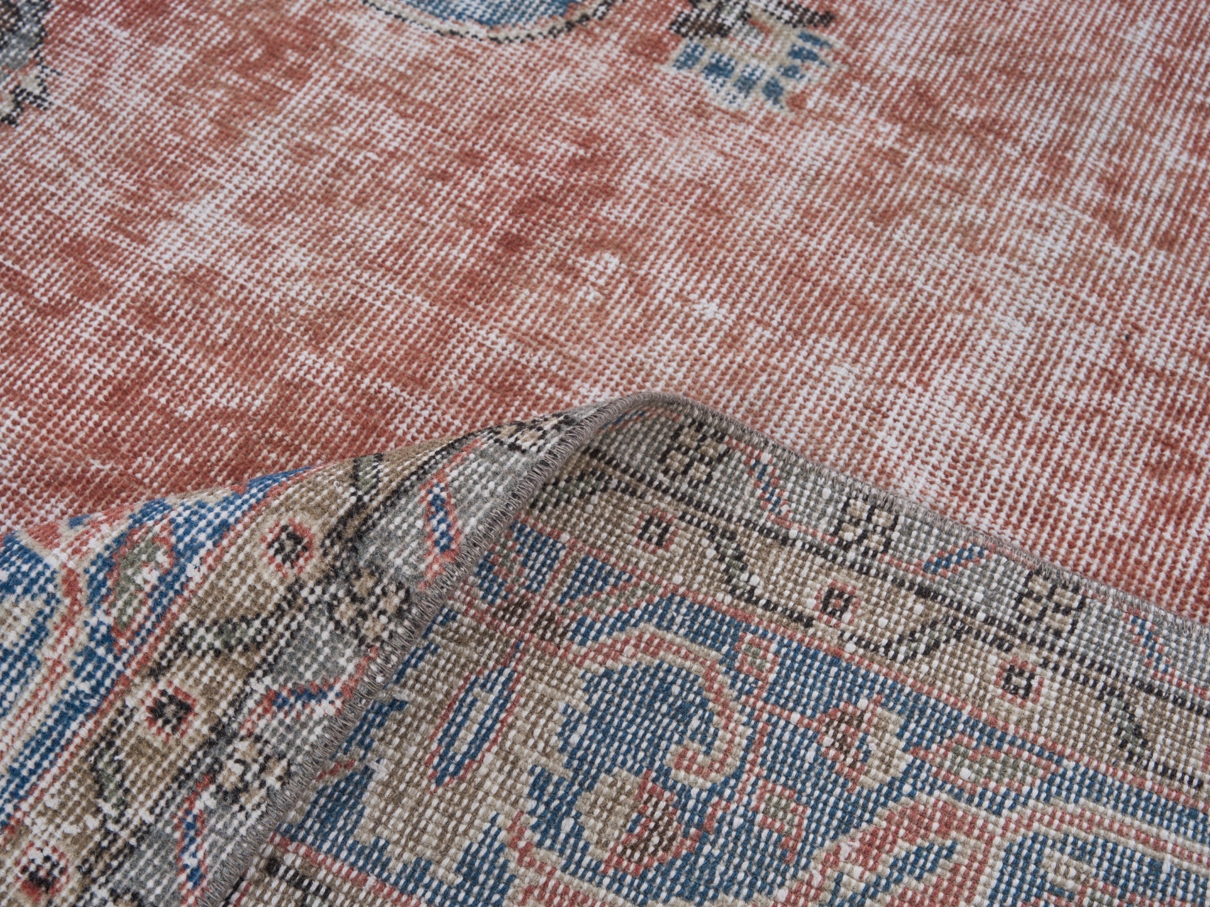 Turkish Isparta oversized rug in terracotta and dark blue, view 9 of 10