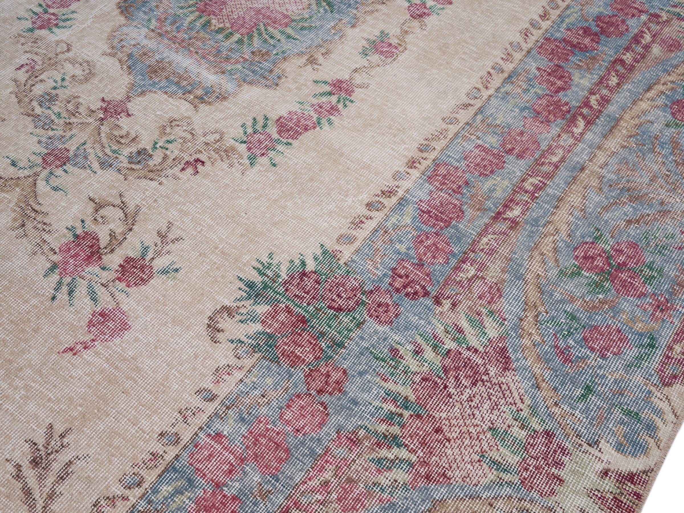 Turkish Isparta area rug in cream and faded red, view 5 of 10