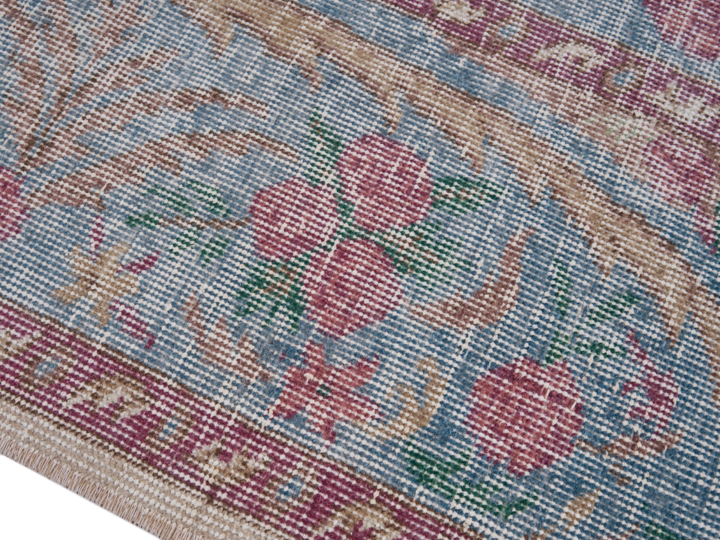 Turkish Isparta area rug in cream and faded red, view 6 of 10