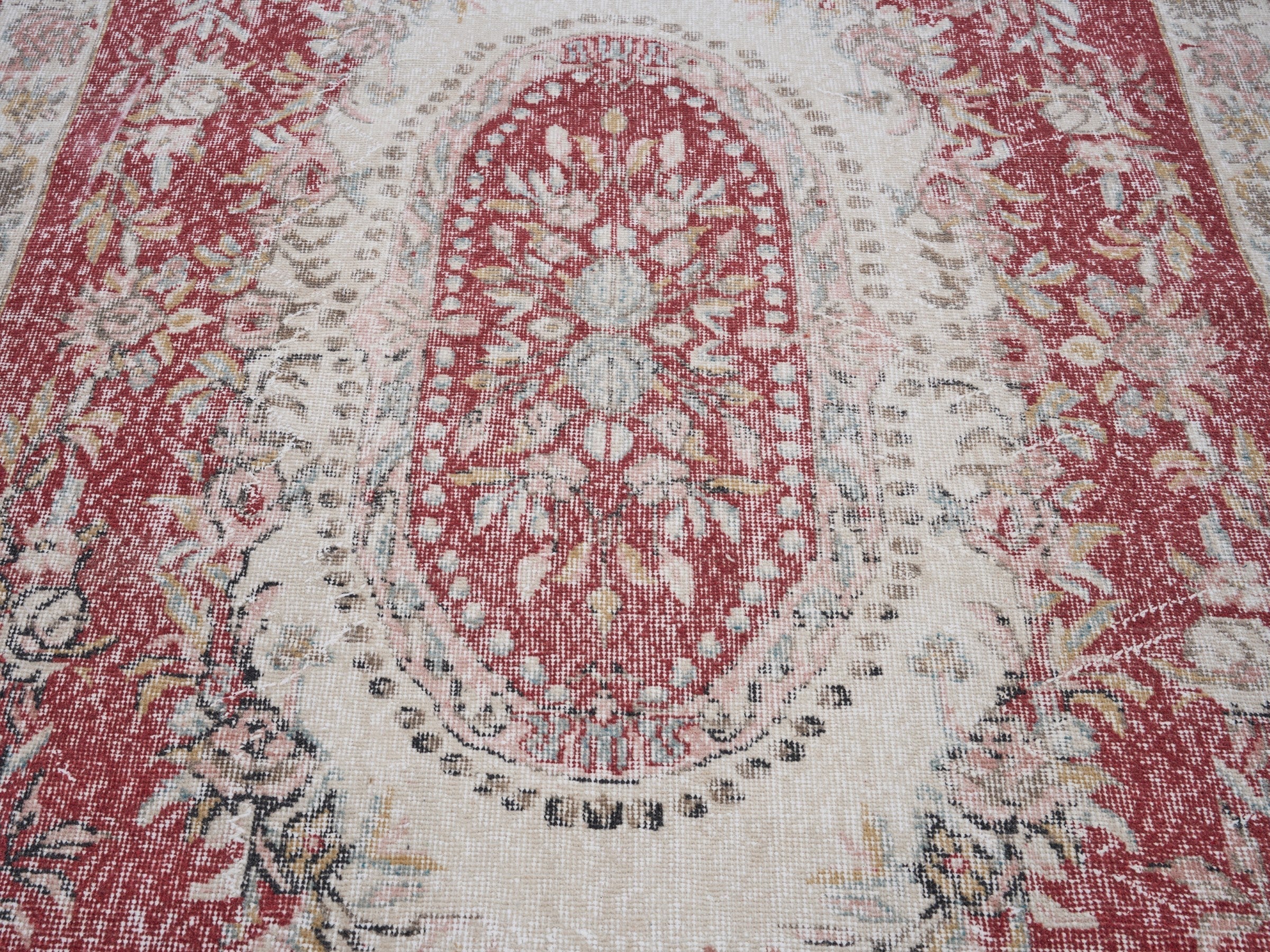 Turkish Isparta area rug in faded red and cream, view 4 of 10
