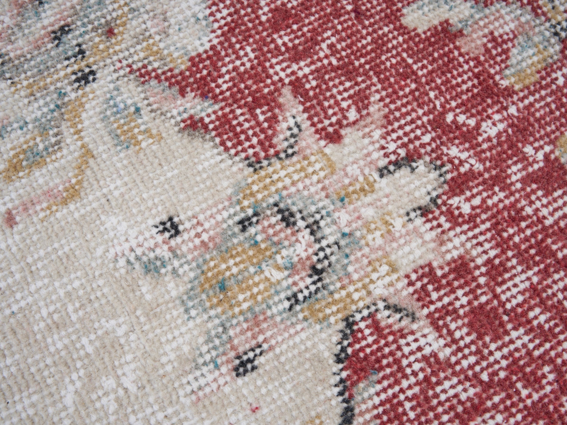 Turkish Isparta area rug in faded red and cream, view 7 of 10