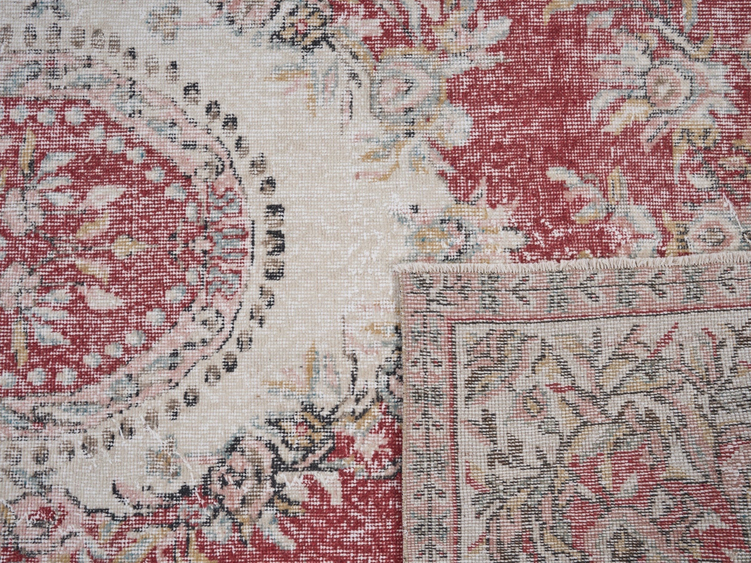 Turkish Isparta area rug in faded red and cream, view 10 of 10