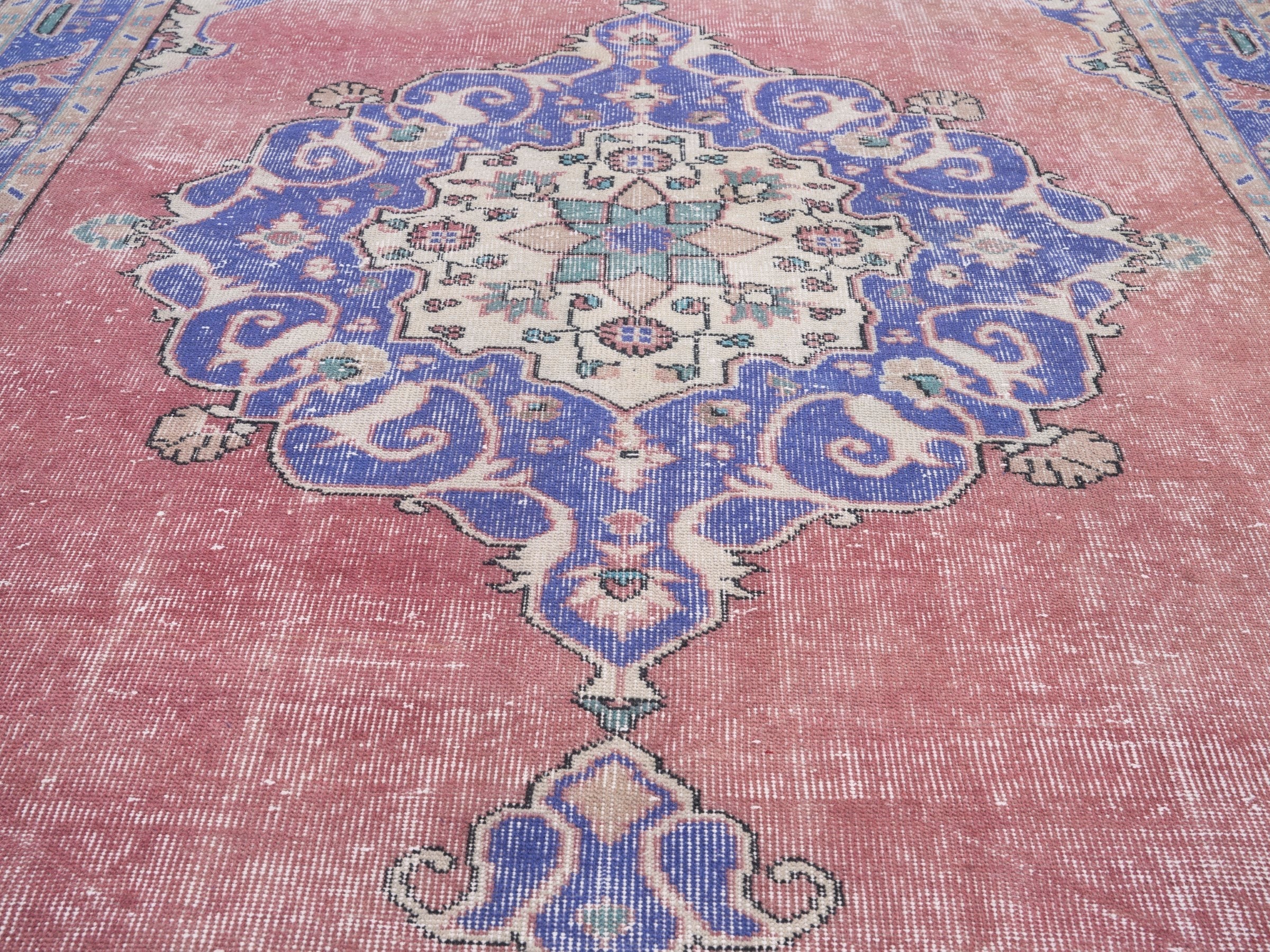 Turkish Isparta area rug in dusty rose and dark blue, view 4 of 10