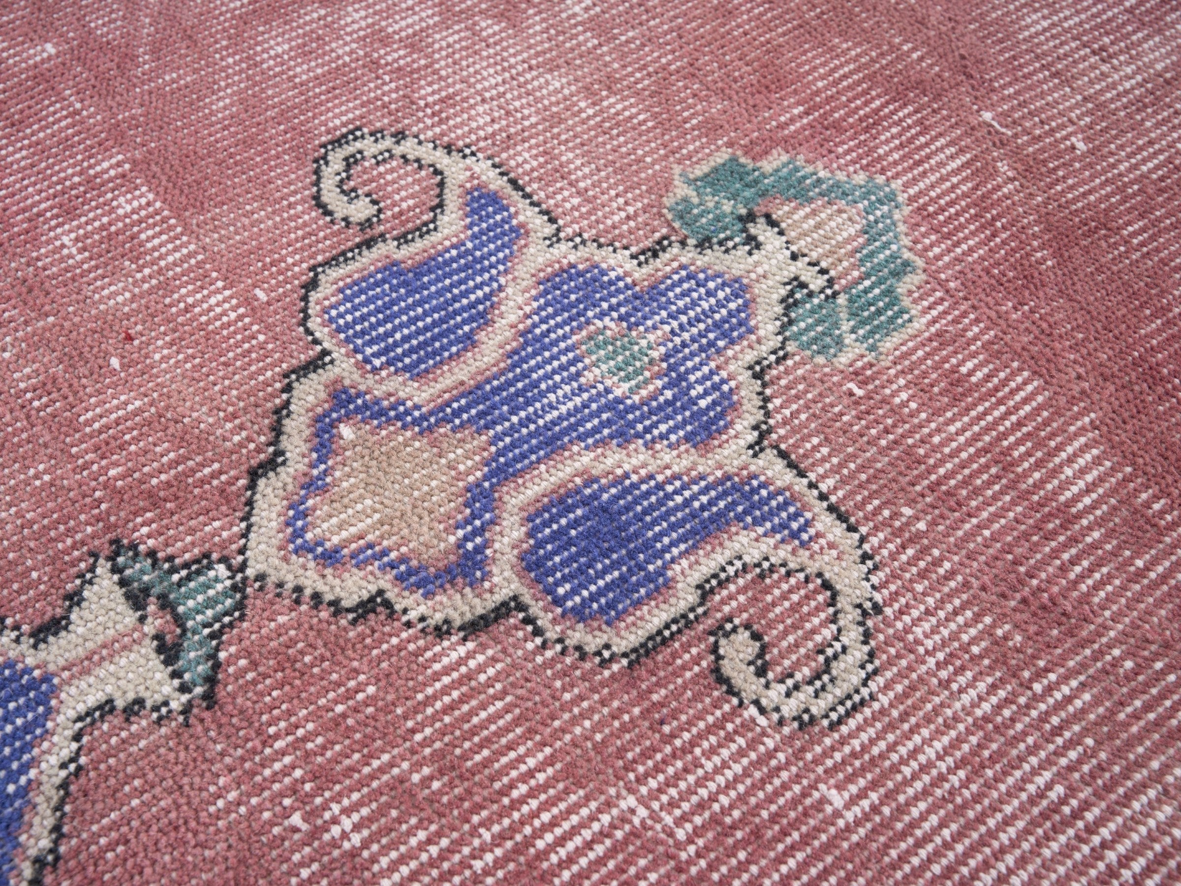 Turkish Isparta area rug in dusty rose and dark blue, view 7 of 10