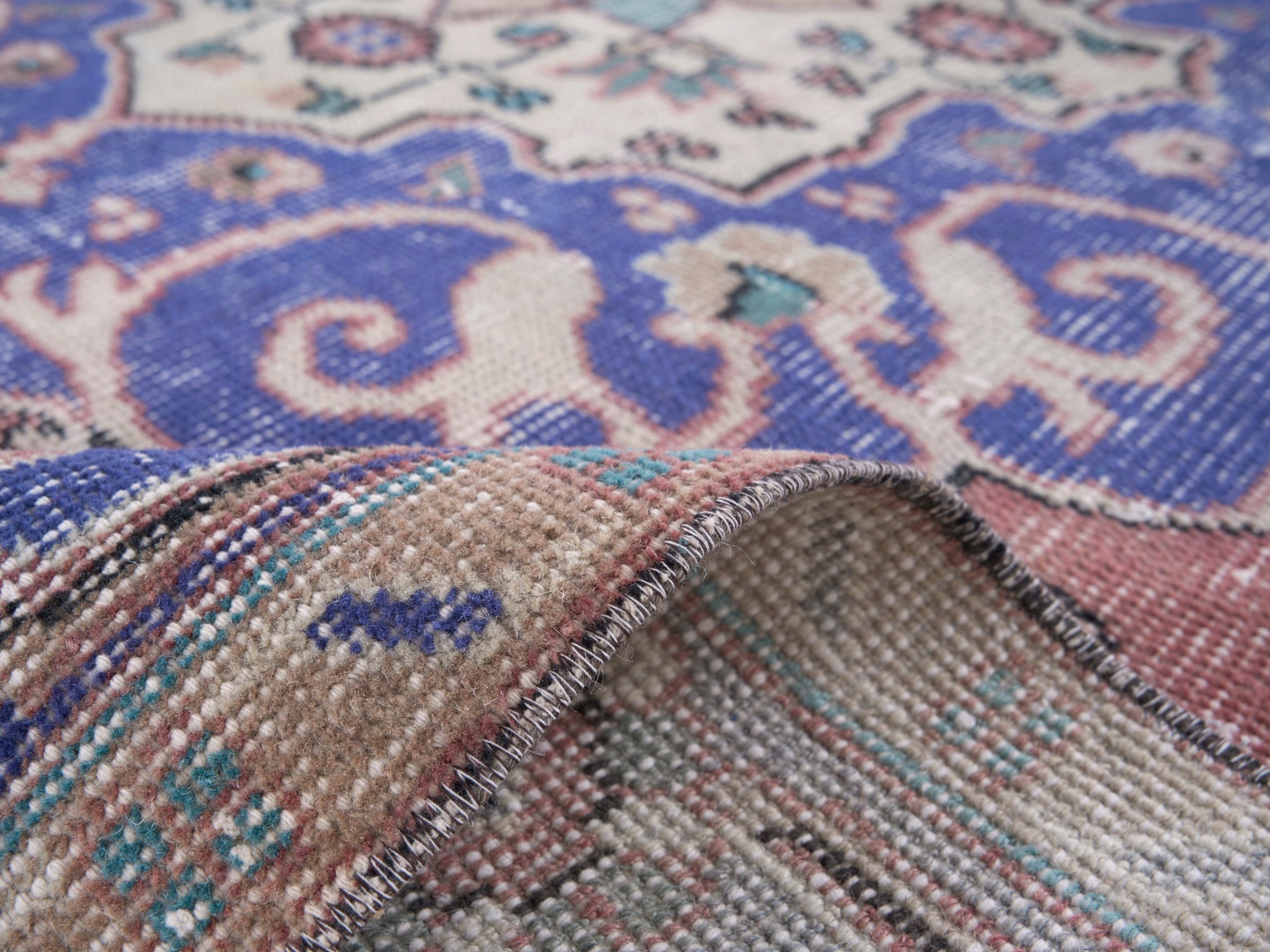 Turkish Isparta area rug in dusty rose and dark blue, view 9 of 10