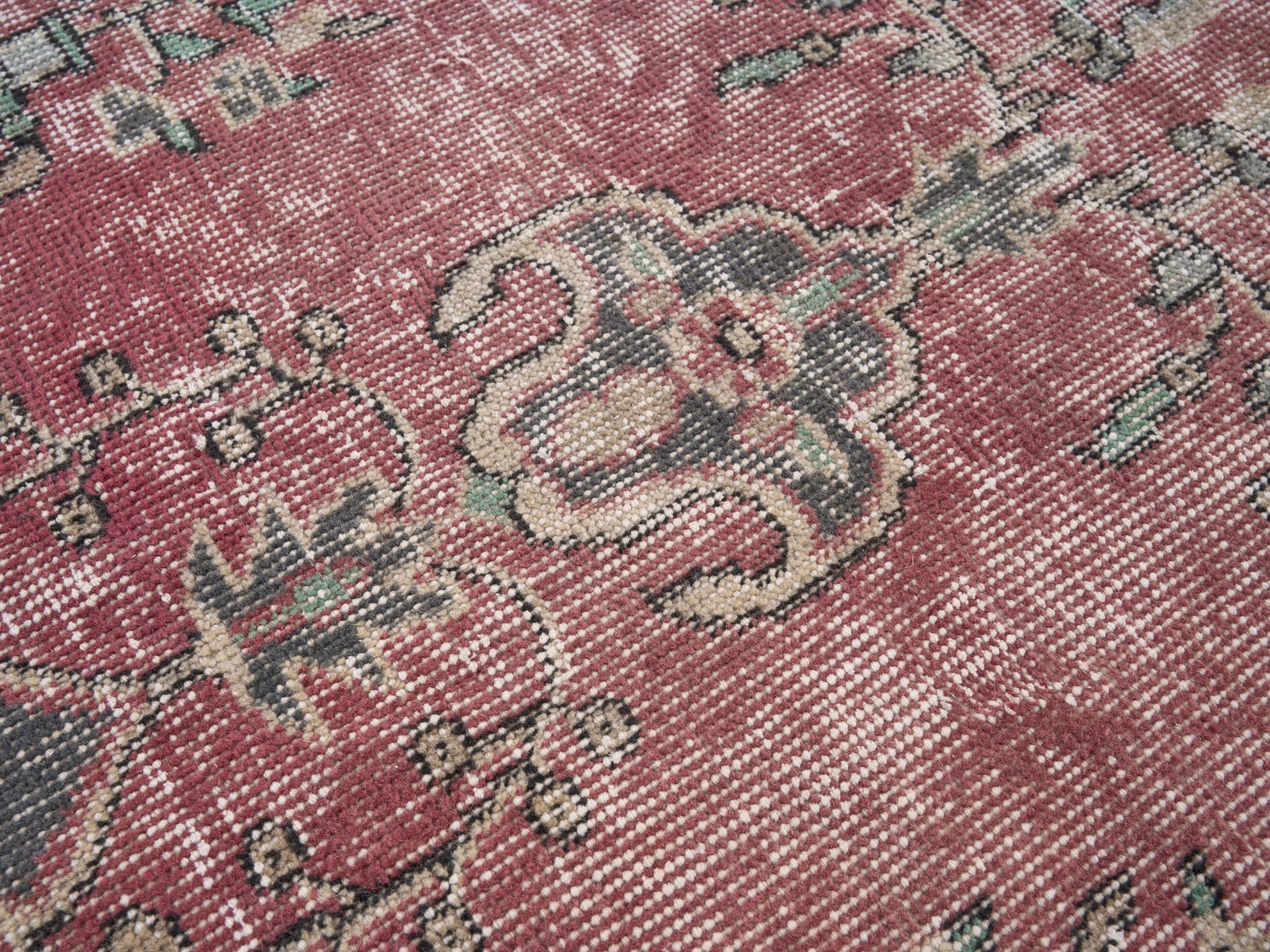 Turkish Isparta area rug in dusty rose and muted pink, view 7 of 10