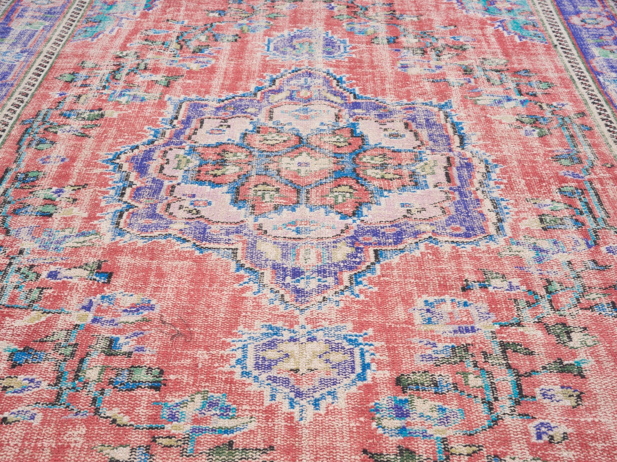 Turkish Manisa area rug in faded red and plum, view 4 of 10